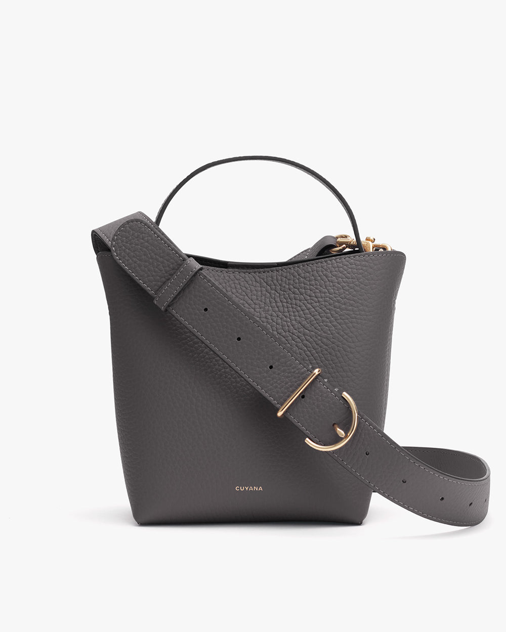 Handbag with a handle, attached strap, and metal accents