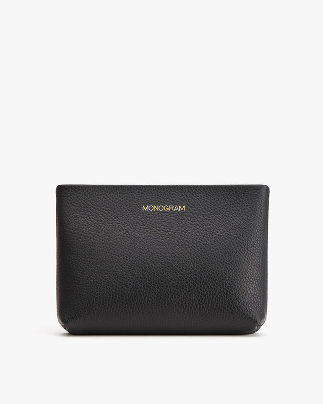Black leather wallet with embossed brand name