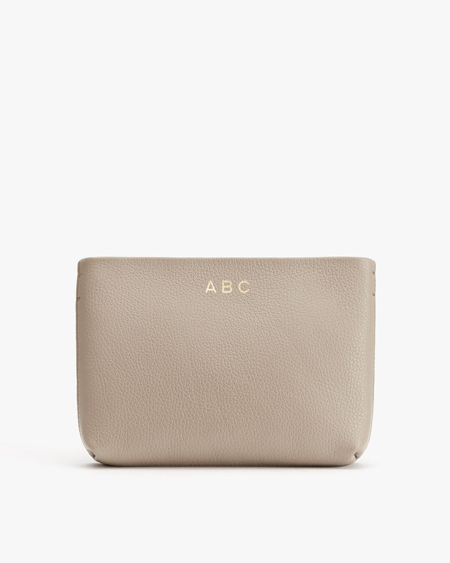Pouch with initials ABC on the front.