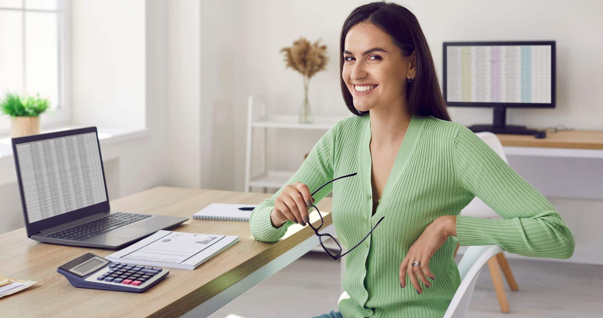 registered agent working on a computer in a home office