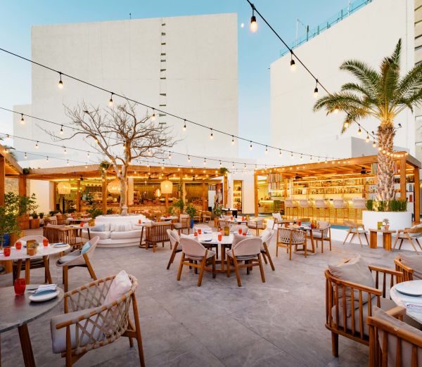 A Courtyard With Tables And Chairs