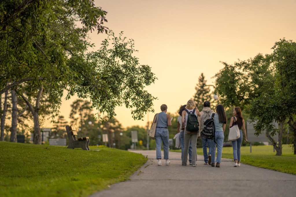 Istock 1412454825 college students walking