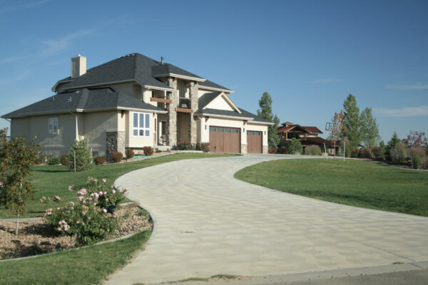 nice home with large curving driveway