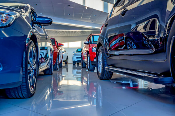 new cars for sale on showroom floor