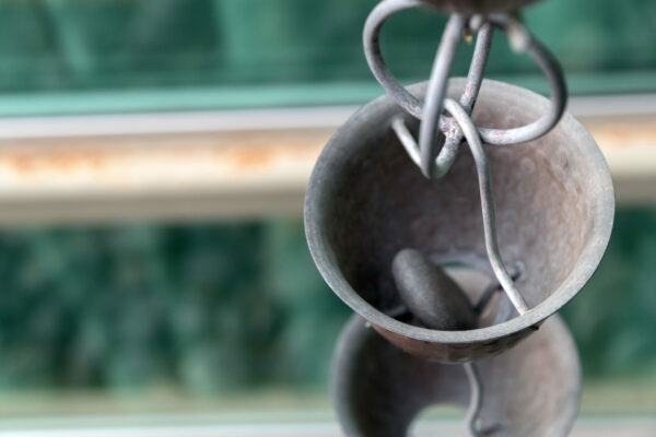 Bronze bell cups rain chain in retreat in Scottsdale, Arizona