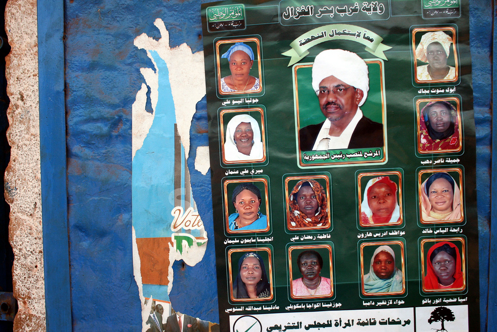 A 2010 campaign poster for the National Congress Party showing all female candidates with President Omar al-Bashir as the centerpiece. Photo by Larisa Epatko