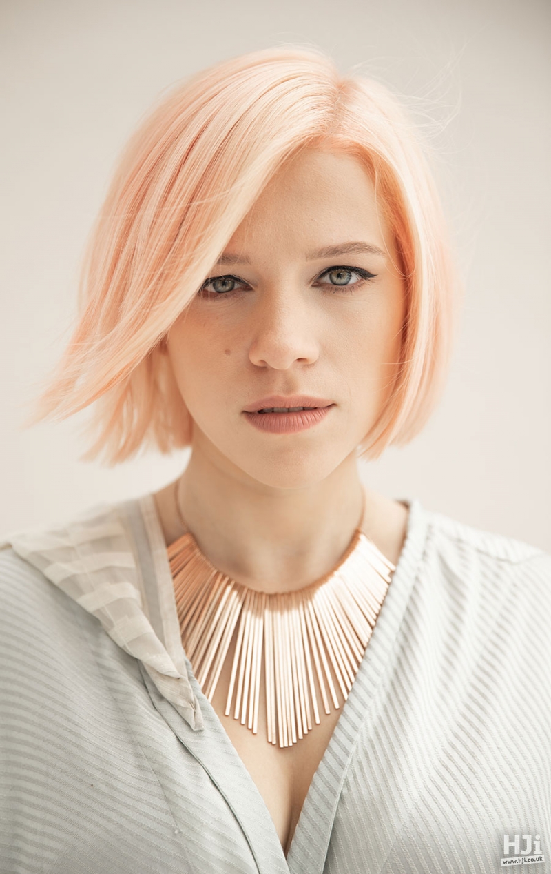 Straight peach-blonde bob with side parting fringe