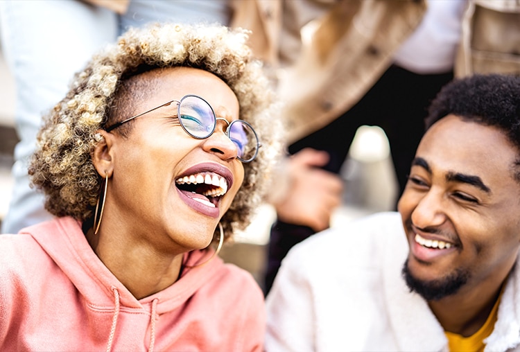 Male and female laughing