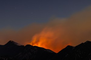 The Eaton Fire reaches a ridge approximately between Mount Lowe and Tom Sloan Saddle in the San Gabriel Mountains and Angeles National Forest.