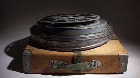 Film reel on briefcase