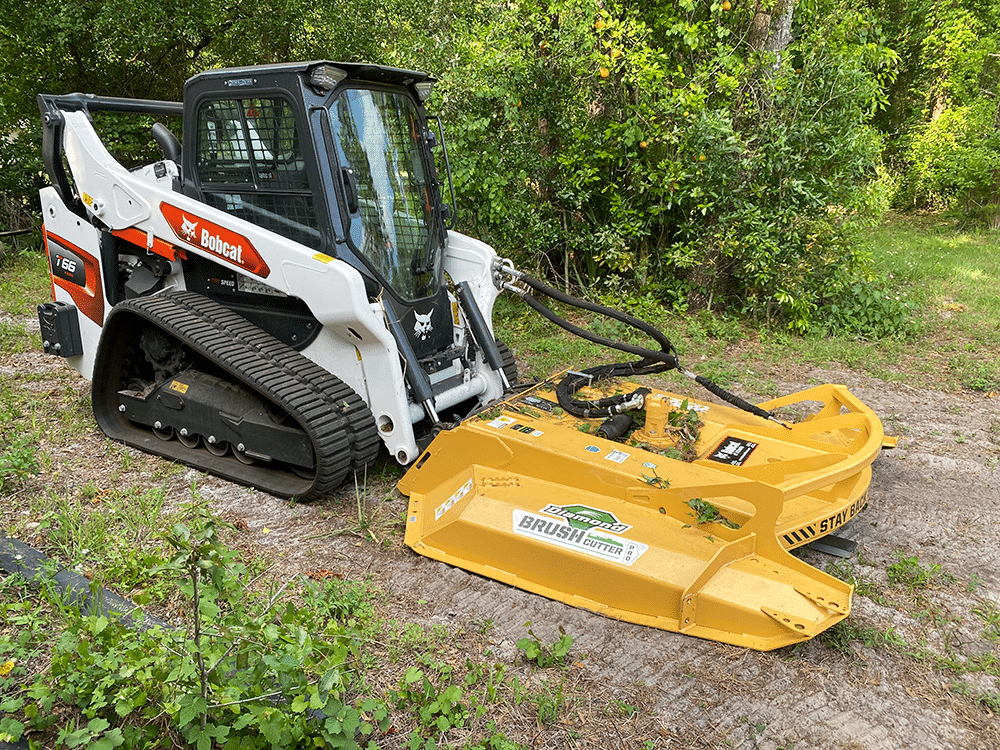 skid steer with brush cutter