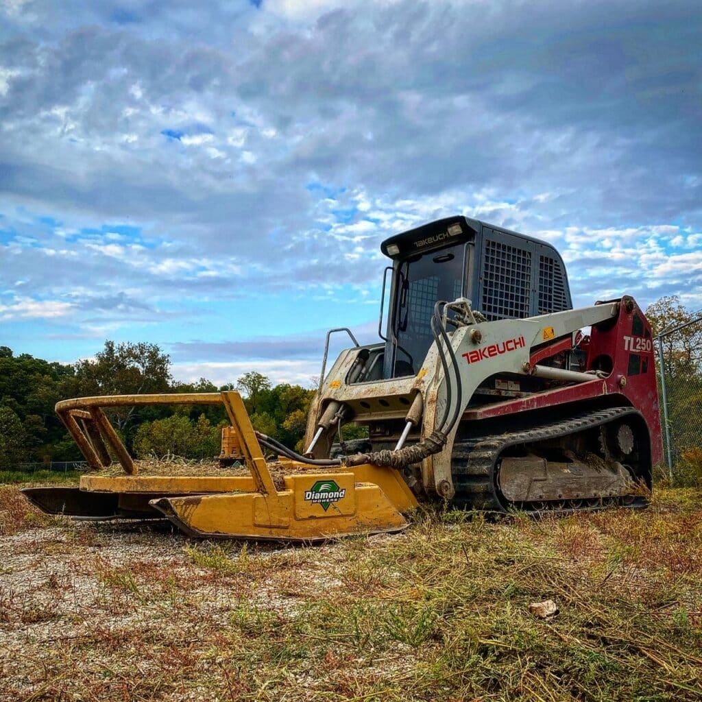 skid steer with a brush cutter