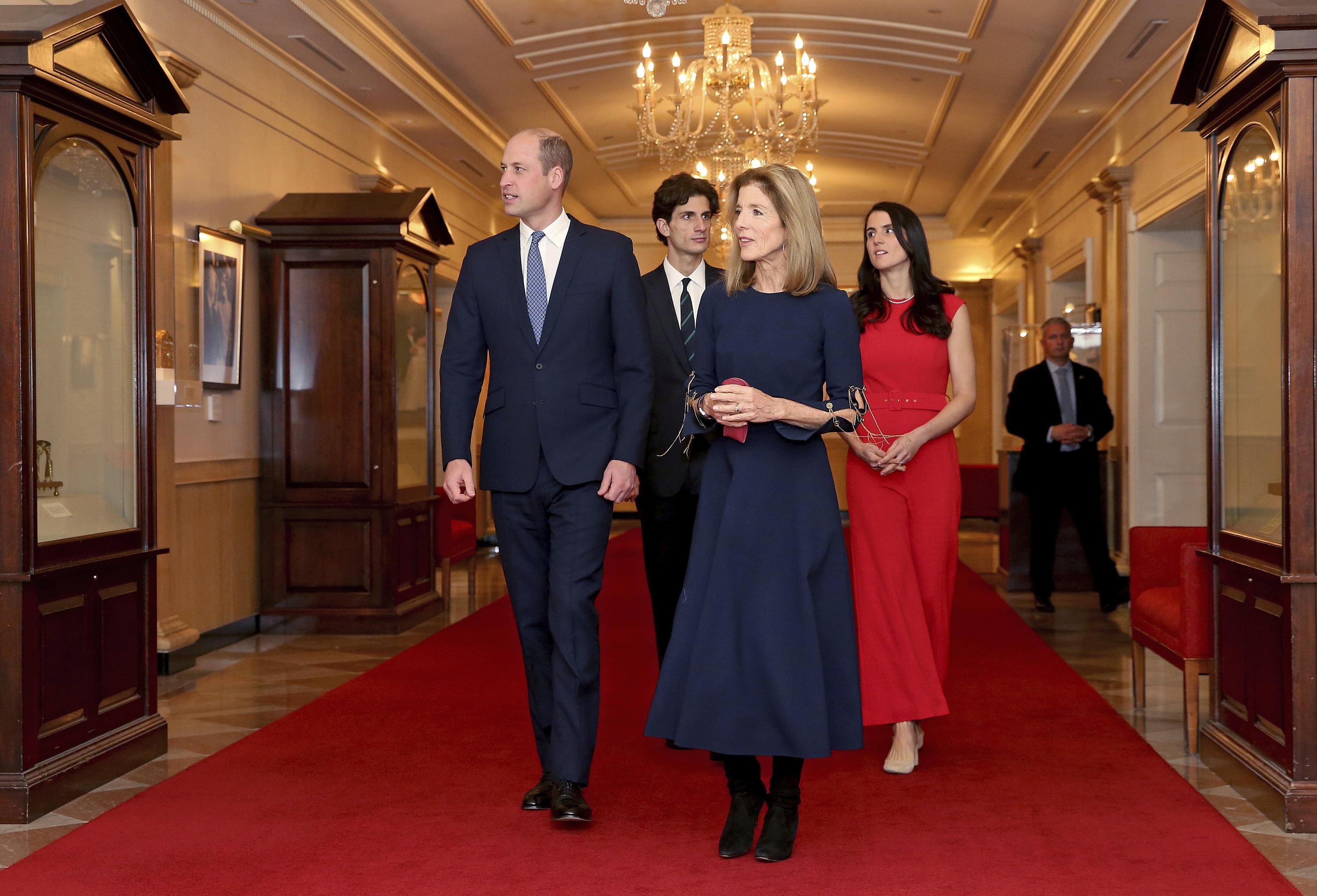 Britain's Prince William and U.S. Ambassador to Australia Caroline Kennedy, daughter of President Kennedy, along with her children John and Tatiana Schlossberg tour the John F. Kennedy Presidential Library, Friday, Dec. 2, 2022, in Boston. (Matt Stone/The Boston Herald via AP, Pool)