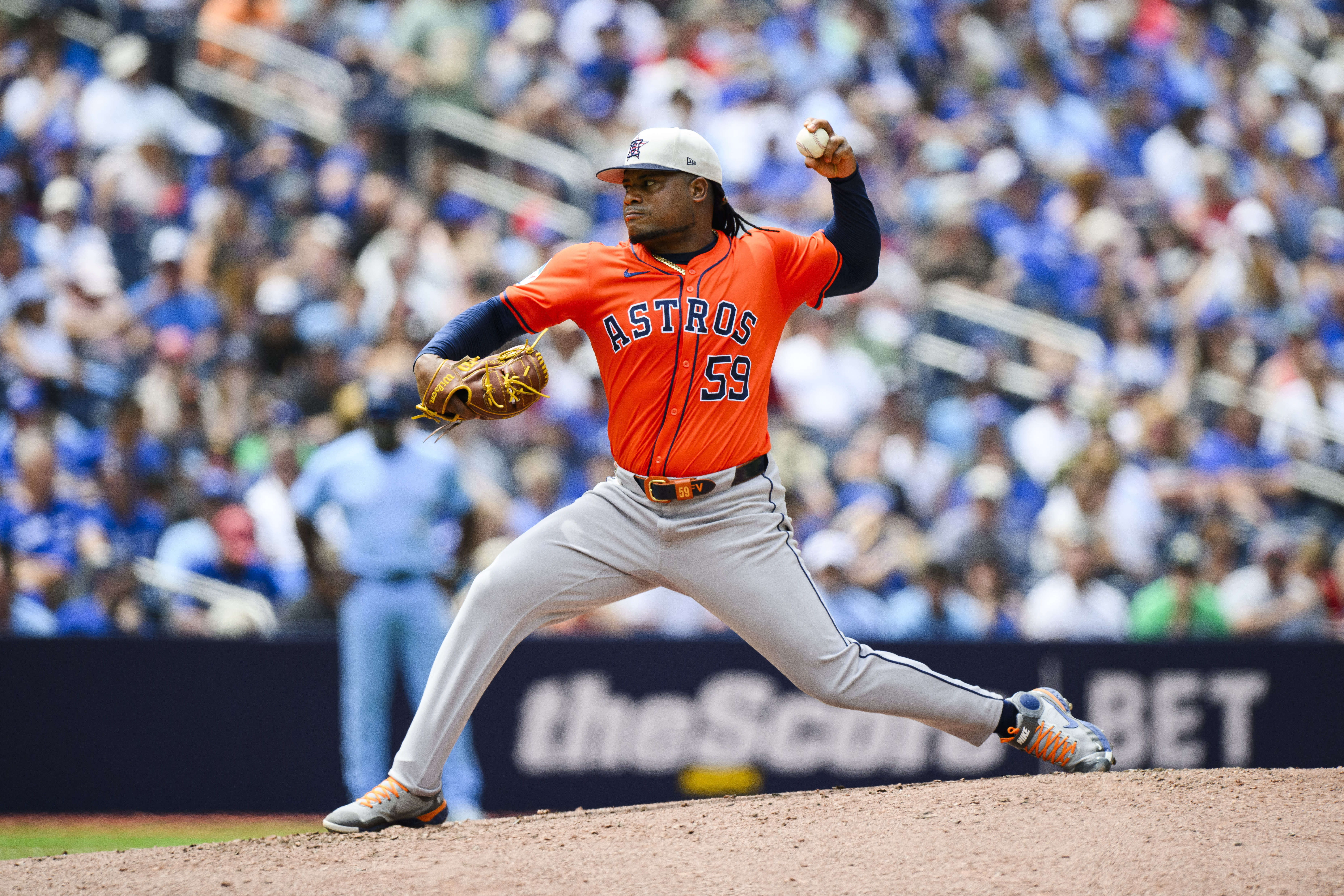 Houston Astros pitcher Framber Valdez (59) throws during the second inning of a baseball game against the Toronto Blue Jays in Toronto on Thursday, July 4, 2024. (Christopher Katsarov/The Canadian Press via AP)