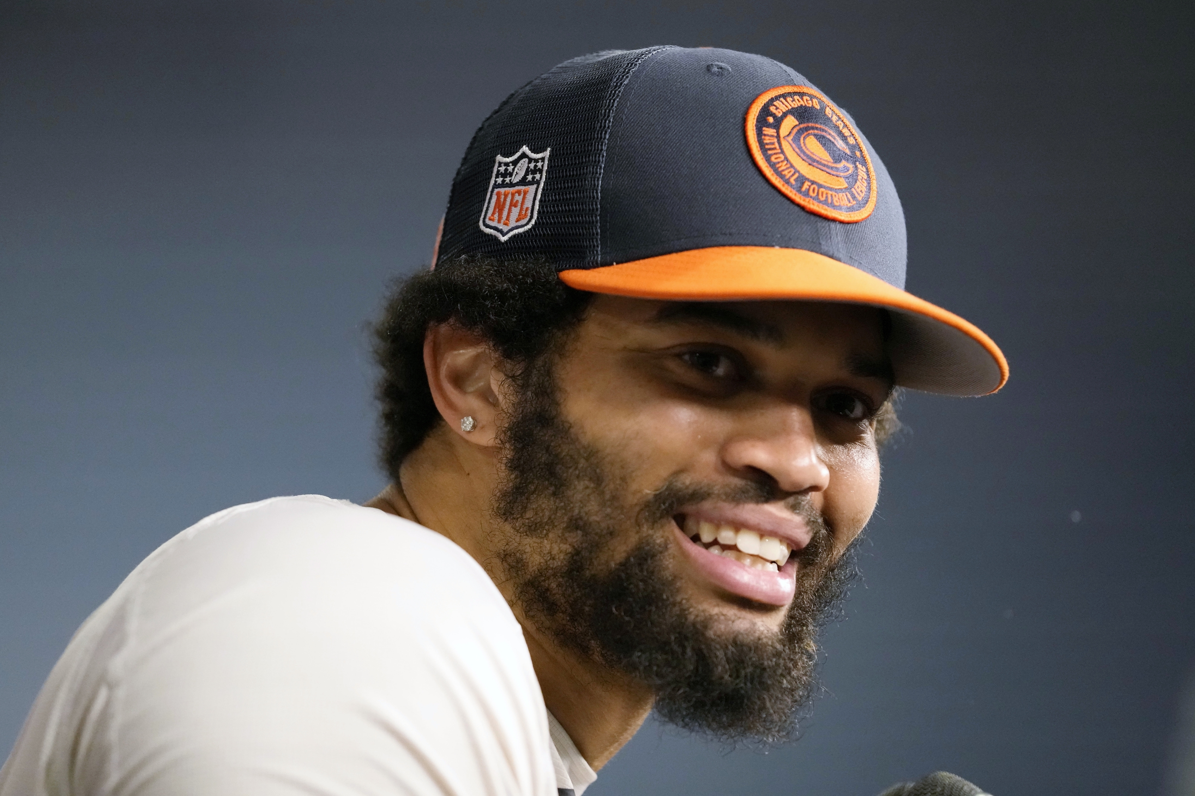 FILE - Chicago Bears quarterback Caleb Williams speaks during a news conference after practice at the NFL football team's mandatory minicamp in Lake Forest, Ill., Thursday, June 6, 2024. The Chicago Bears have locked in their top two rookies, agreeing to four-year contracts with No. 1 overall draft pick Caleb Williams and No. 9 selection Rome Odunze and avoiding any training camp drama with their prized quarterback and receiver. (AP Photo/Nam Y. Huh, File)