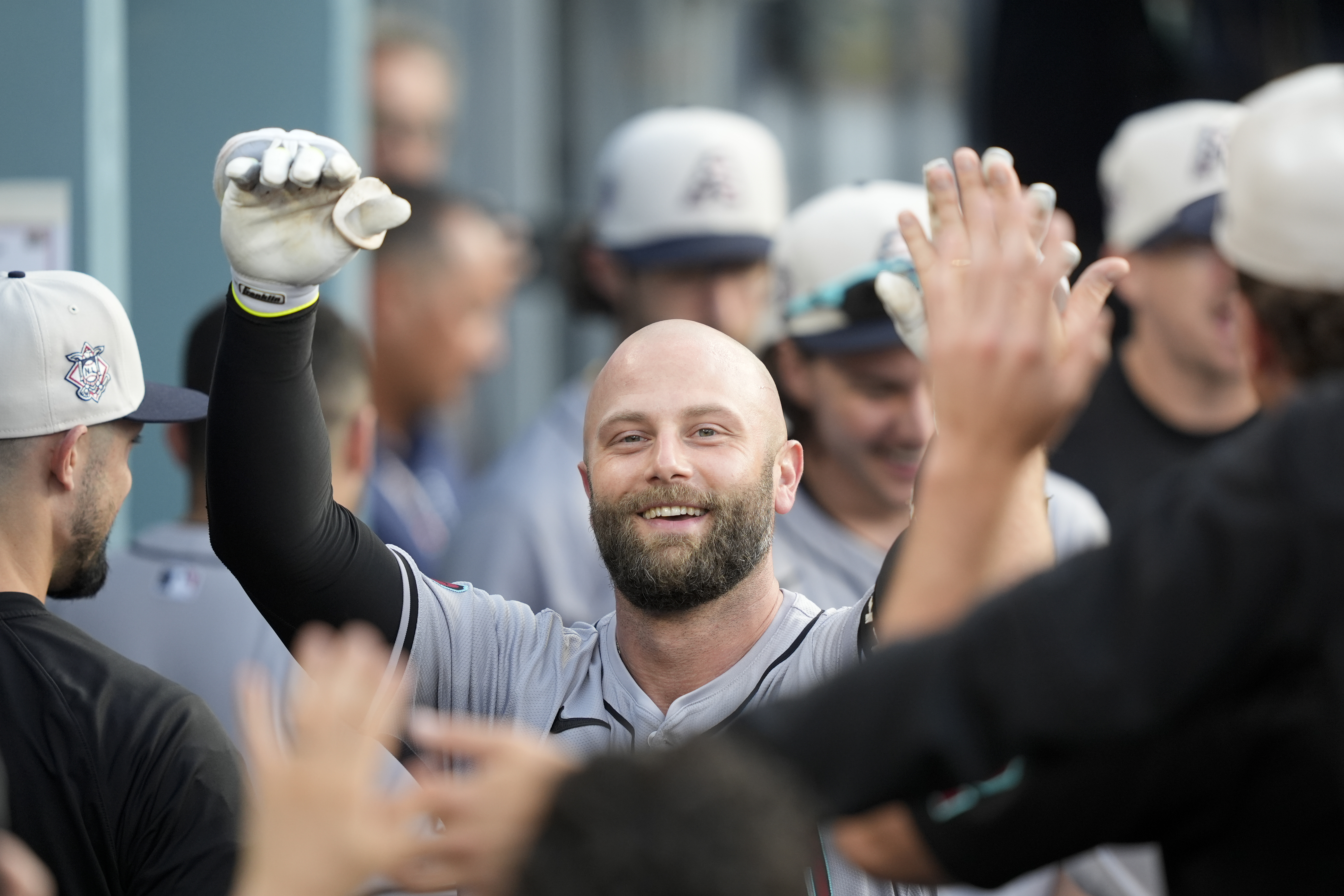 Arizona Diamondbacks' Christian Walker celebrates after his two-run home run during the third inning of a baseball game against the Los Angeles Dodgers, Thursday, July 4, 2024, in Los Angeles. (AP Photo/Ryan Sun)