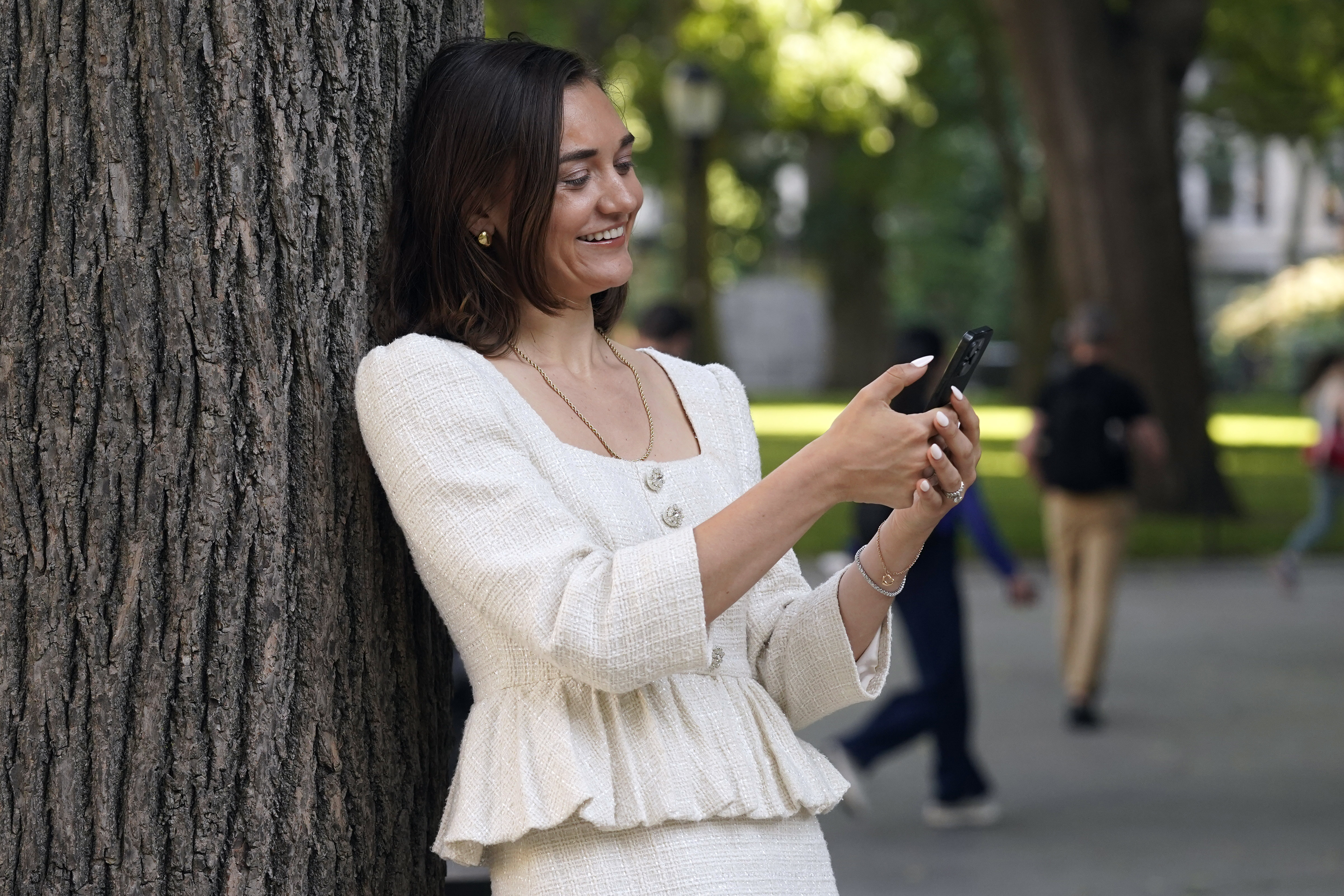 Larissa May, of HalfTheStory, is photographed in New York's Madison Square Park, Tuesday, June 4, 2024. The site works with young people to build better relationships with technology, on their own terms, starting in middle school even before some kids have a device. To May, abstinence is not the answer to teens' problems with social media. (AP Photo/Richard Drew)