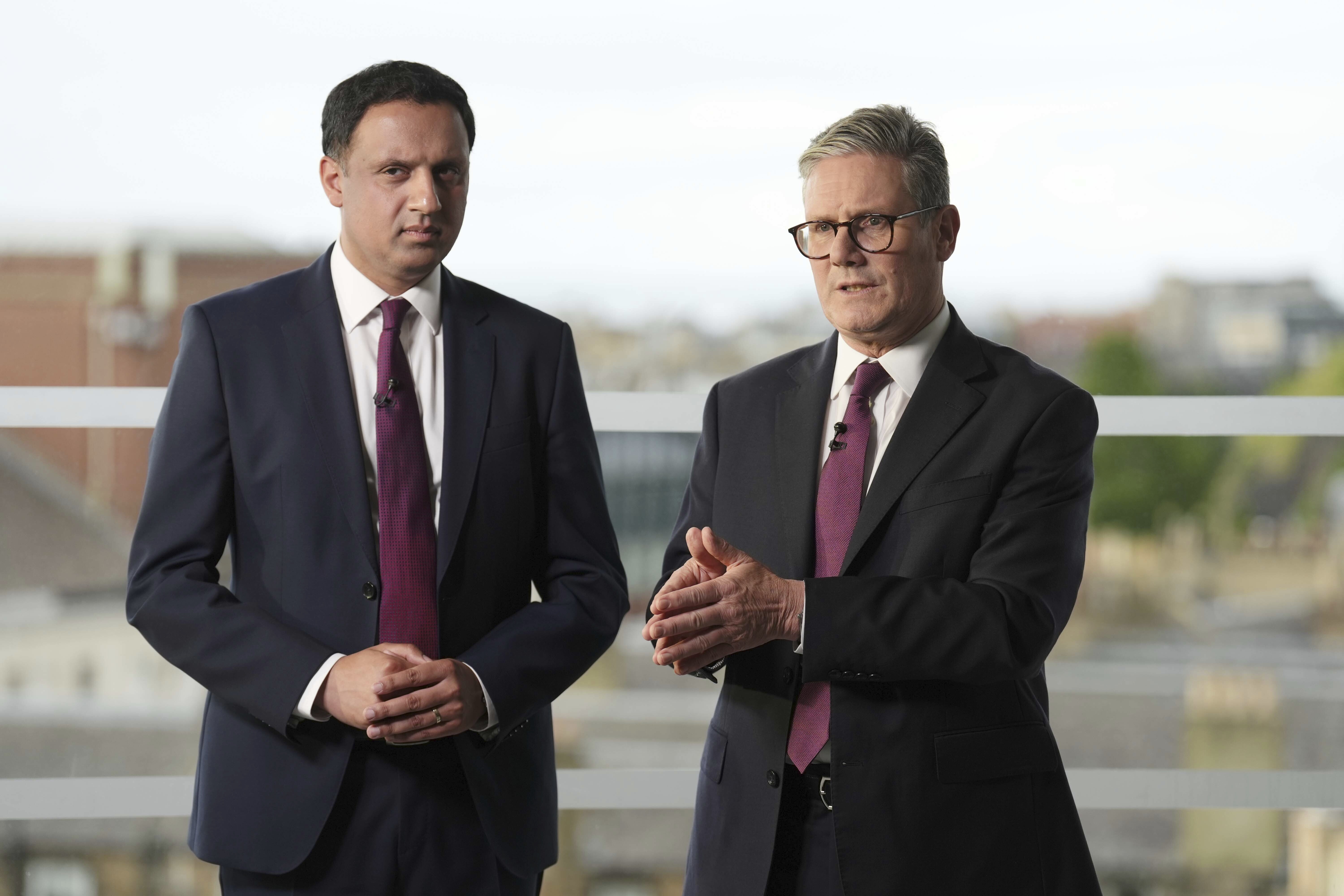 British Prime Minister Sir Keir Starmer, right, and Scottish Labour Leader Anas Sarwar during an event in Edinburgh to welcome new Labour MPs in Scotland, following Labour's victory in the 2024 General Election, Sunday July 7, 2024. (Andrew Milligan/PA via AP)