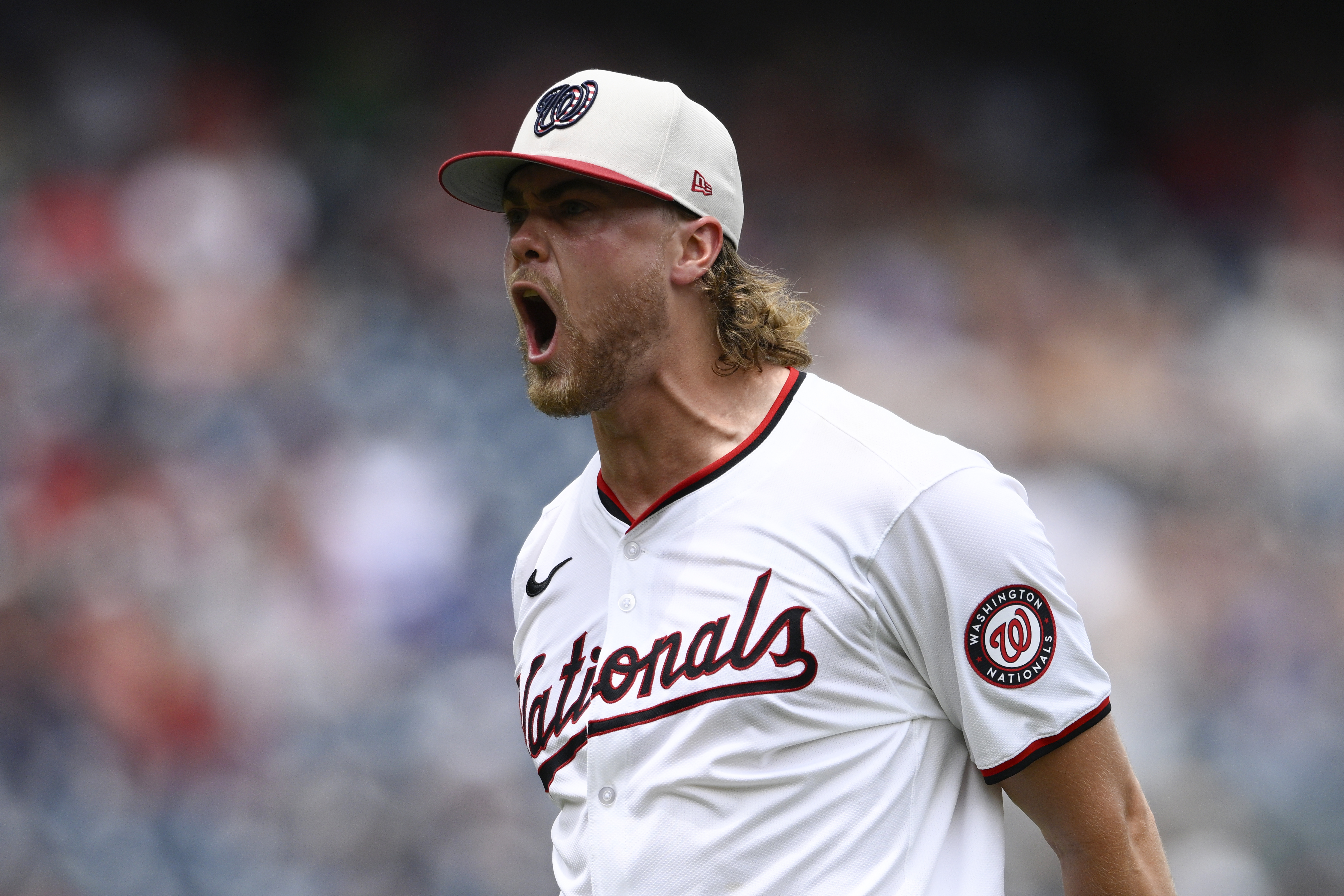 Washington Nationals starting pitcher Jake Irvin reacts after he struck out New York Mets' Tyrone Taylor to end the top of the eighth inning of a baseball game against the New York Mets, Thursday, July 4, 2024, in Washington. Irvin allowed just one hit and issued one walk in eight innings, Jesse Winker hit a pinch-hit home run and the Washington Nationals beat the New York Mets 1-0 (AP Photo/Nick Wass)