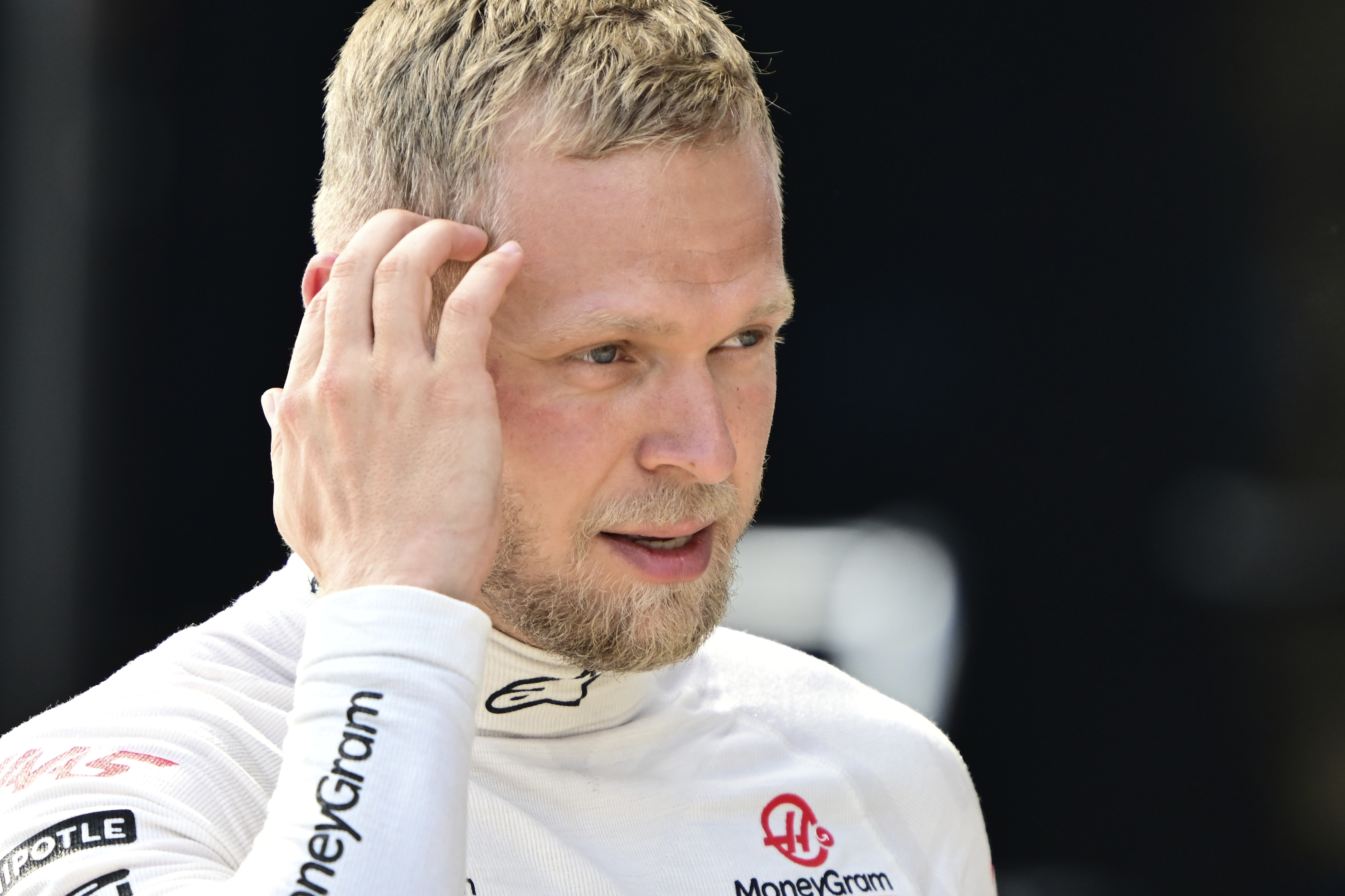 FILE - Haas driver Kevin Magnussen of Denmark walks at the Red Bull Ring racetrack in Spielberg, Austria, Saturday, June 29, 2024. (AP Photo/Christian Bruna, Pool, File)