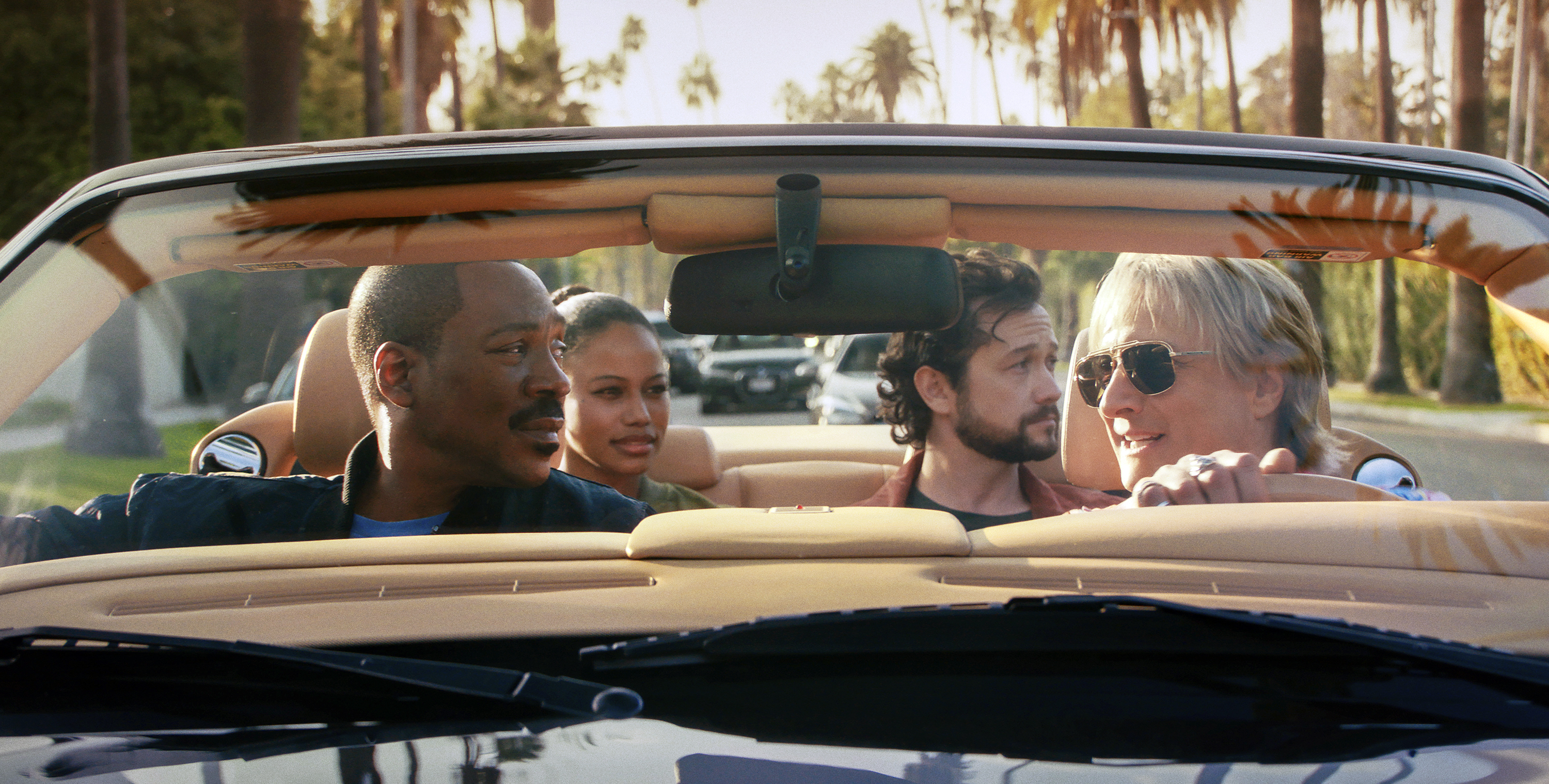 his image released by Netflix shows Eddie Murphy, from left, Taylour Paige, Joseph Gordon-Levitt and Bronson Pinchot in "Beverly Hills Cop: Axel F." (Netflix via AP)