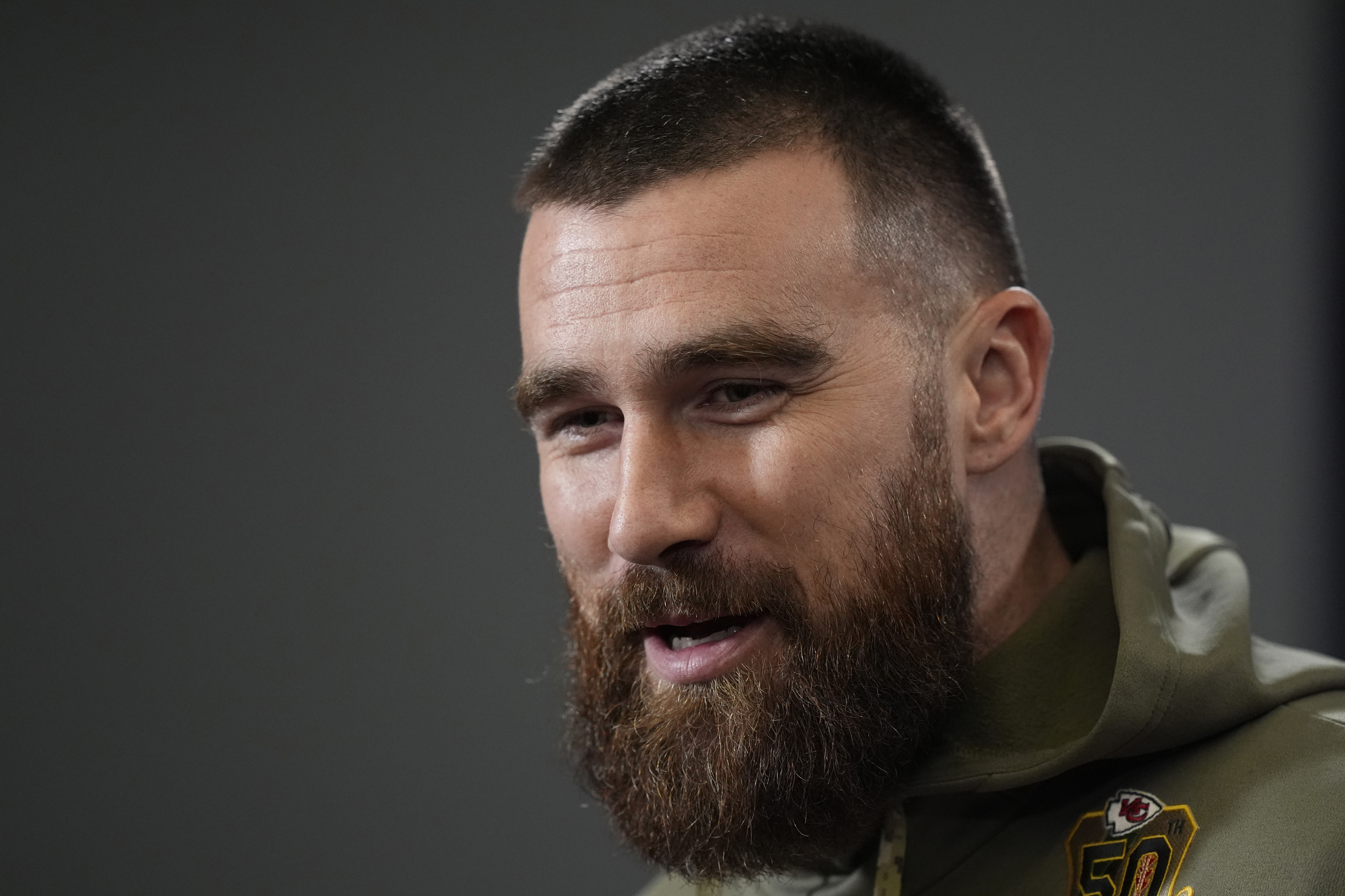 Kansas City Chiefs tight end Travis Kelce talks to the media before the team's NFL football practice Friday, Feb. 2, 2024 in Kansas City, Mo. The Chiefs will play the San Francisco 49ers in Super Bowl 58. (AP Photo/Charlie Riedel)