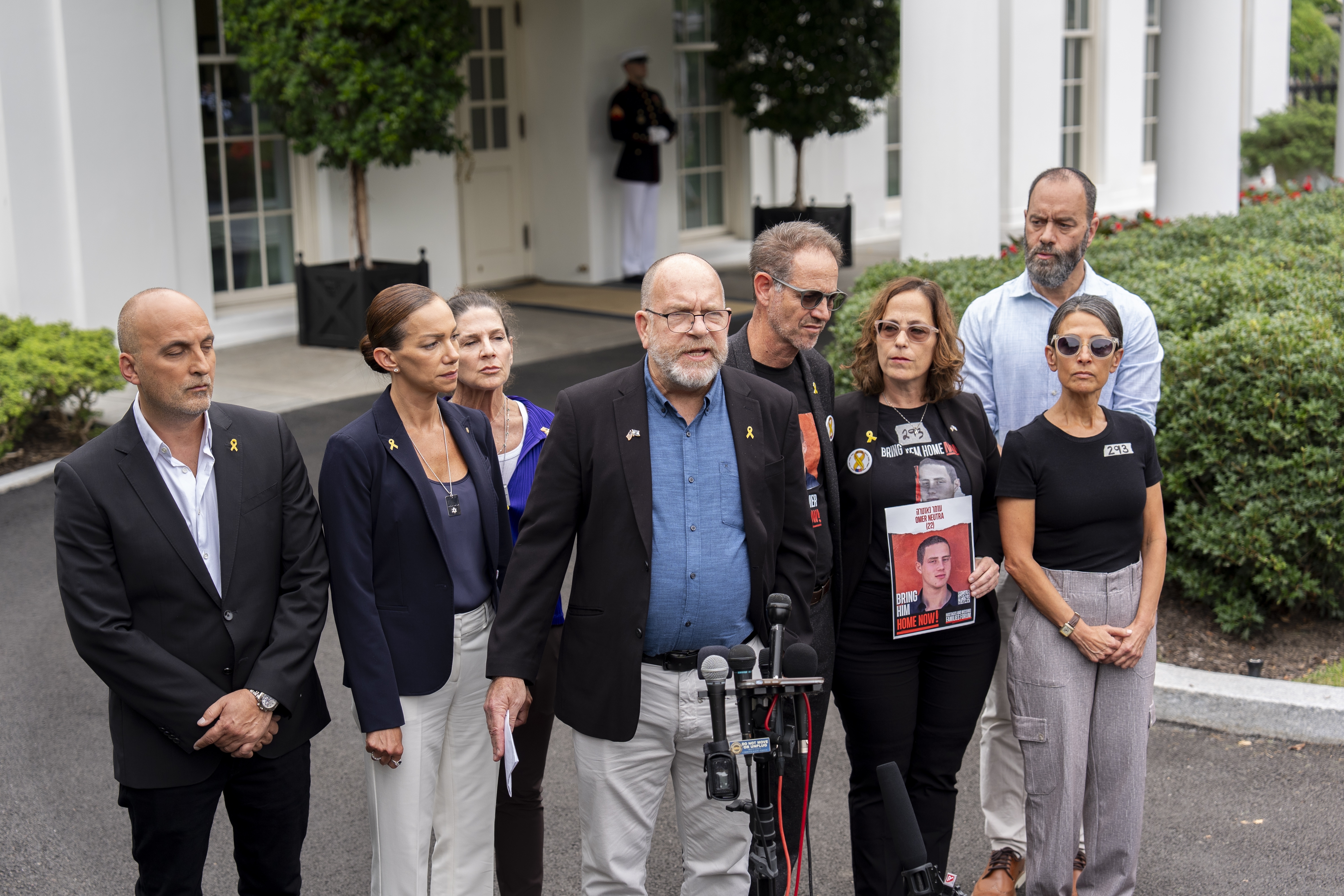 Jonathan Dekel-Chen, center, father of American hostage Sagui Dekel-Chen, along with other families of hostages in Gaza, speaks with reporters following their meeting with President Joe Biden and Israeli Prime Minister Benjamin Netanyahu at the White House in Washington, Thursday, July 25, 2024. (AP Photo/Stephanie Scarbrough)