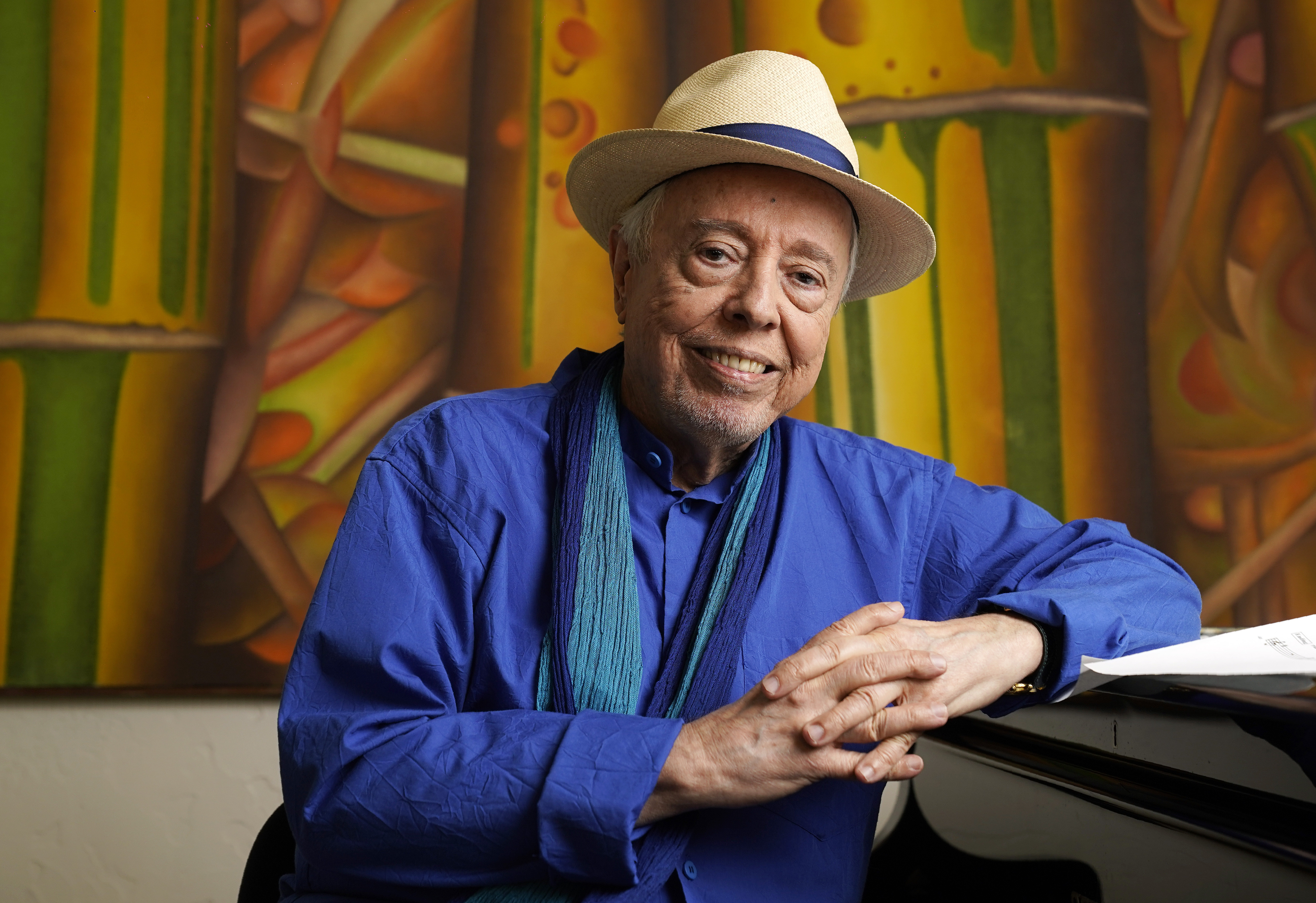 FILE - Brazilian musician Sergio Mendes sits for a portrait at home in Los Angeles, May 18, 2021. (AP Photo/Chris Pizzello, File)