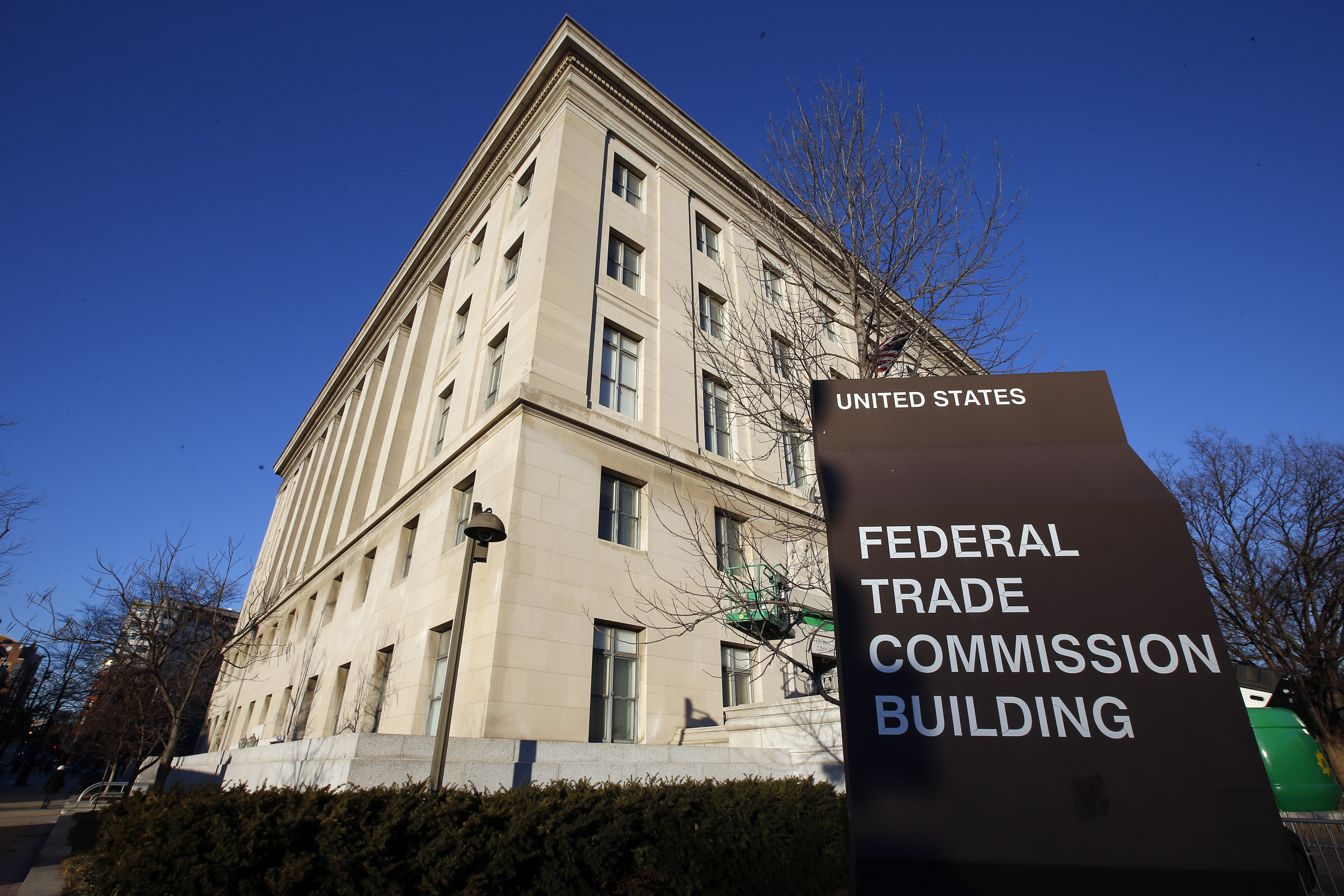 FILE - The Federal Trade Commission building is seen, Jan. 28, 2015, in Washington. The Federal Trade Commission is taking action against Arise Virtual Solutions, a gig work company, saying it misled consumers about the money they could make on its platform. (AP Photo/Alex Brandon, File)