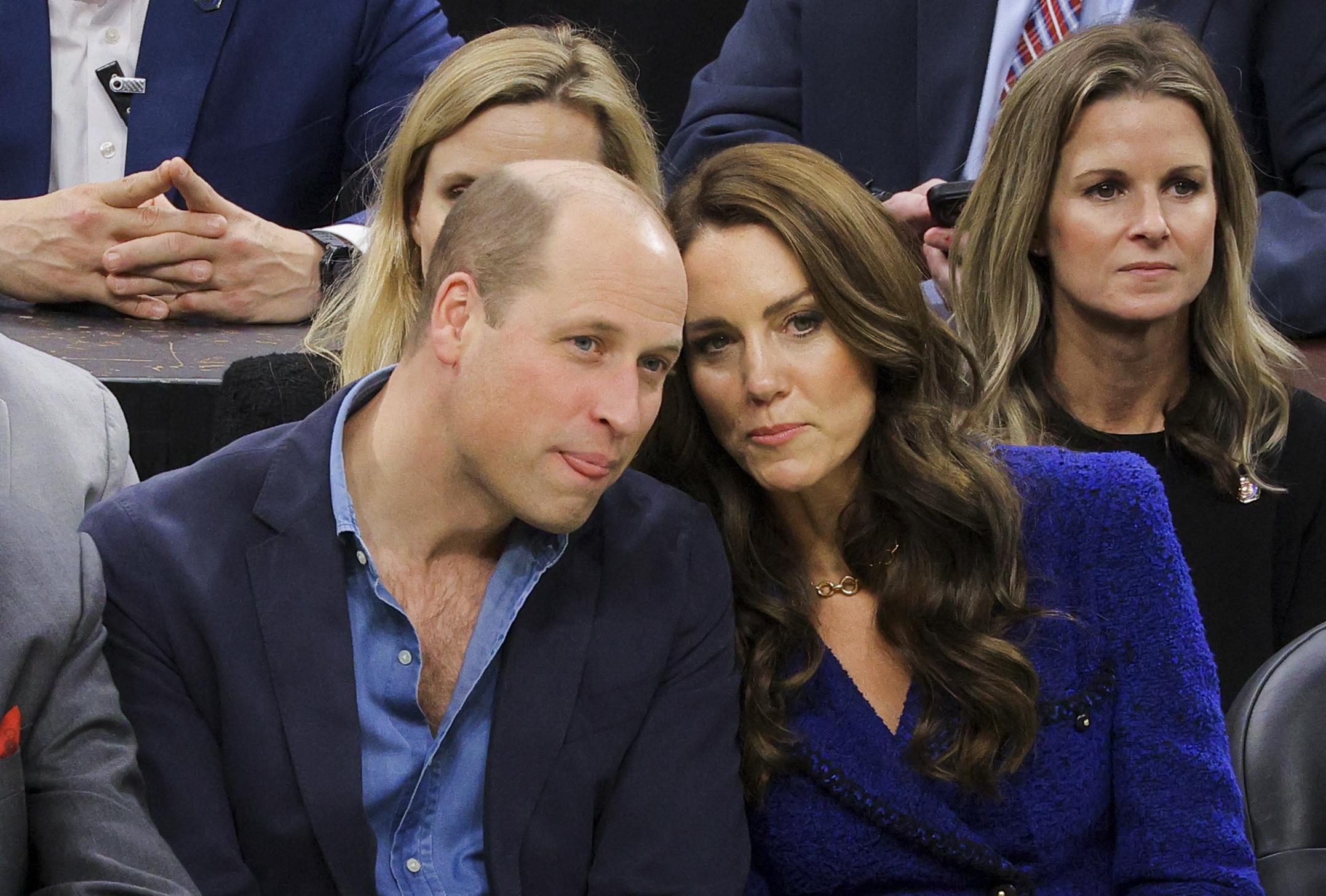 Britain's Prince William and Kate, Princess of Wales, watch the NBA basketball game between the Boston Celtics and the Miami Heat on Wednesday, Nov. 30, 2022, in Boston. (Brian Snyder/Pool Photo via AP)