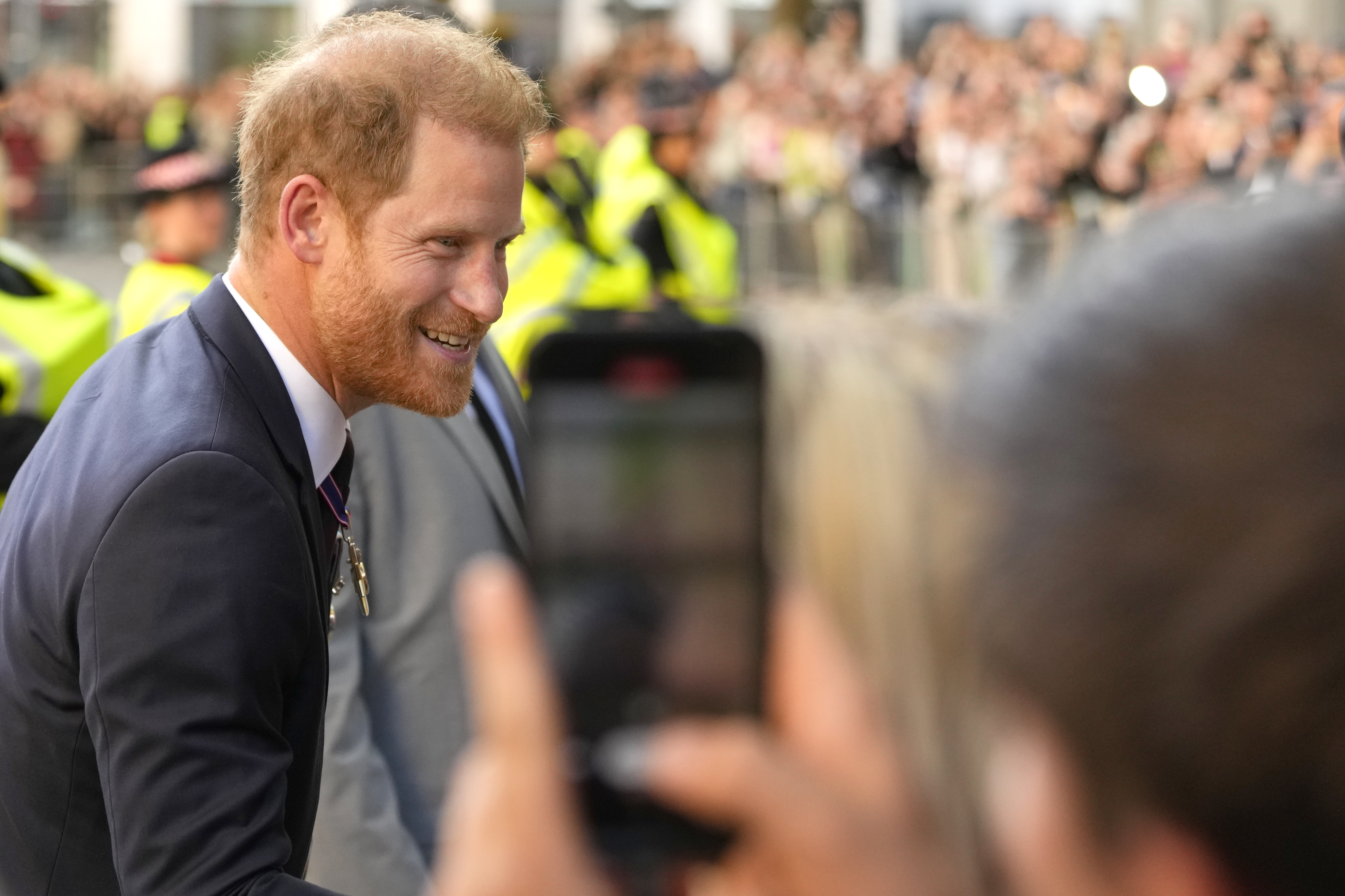 FILE - Britain's Prince Harry meets the crowd as he leaves after attending an Invictus Games Foundation 10th Anniversary Service of Thanksgiving at St Paul's Cathedral in London, on May 8, 2024. An attorney for the publisher of The Sun tabloid Thursday accused Prince Harry of engaging in “shocking” and “extraordinary” obfuscation by destroying evidence it was seeking in his lawsuit claiming the newspaper violated his privacy by unlawfully snooping on him. (AP Photo/Kirsty Wigglesworth, File)