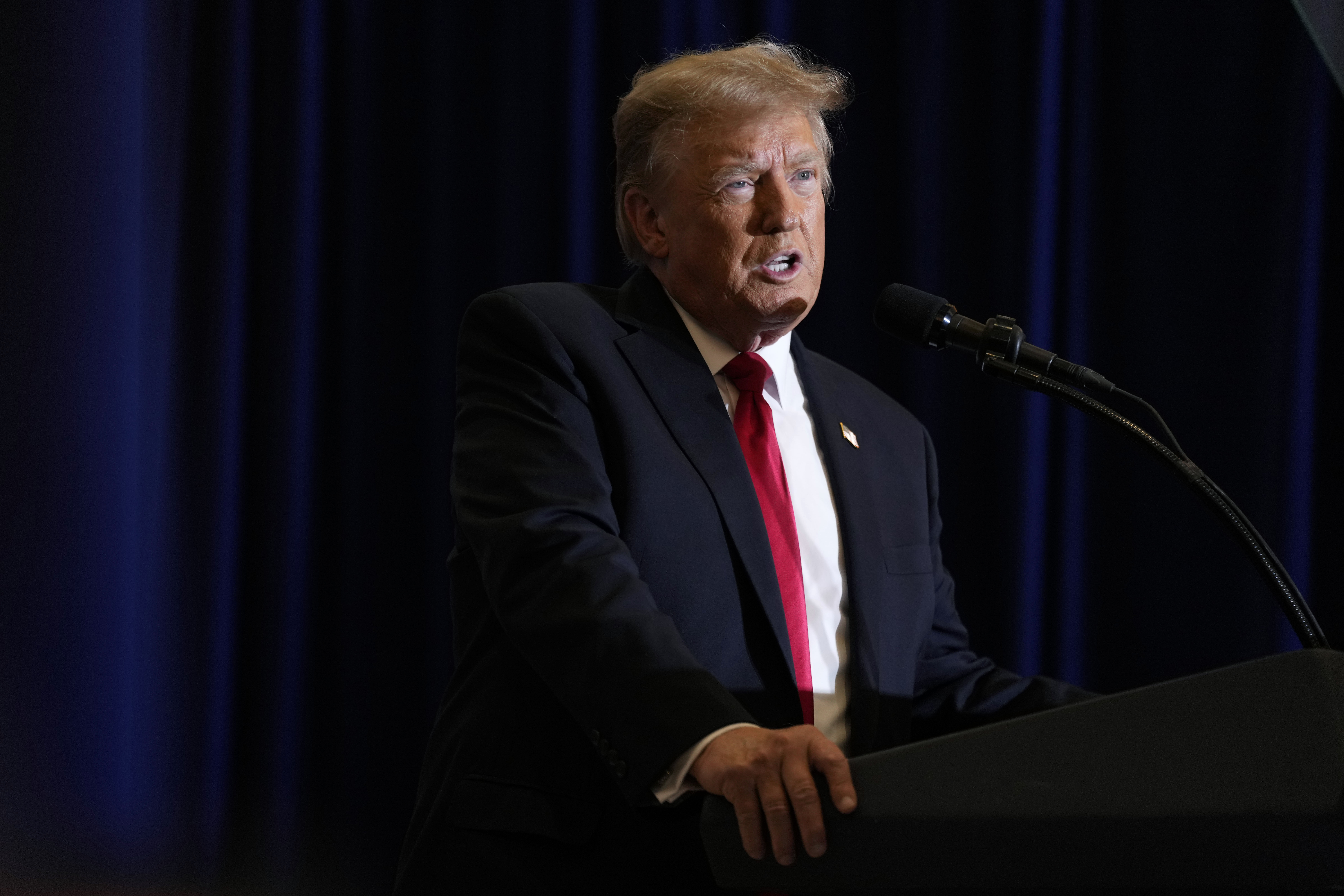 FILE - Former President Donald Trump speaks during a commit to caucus rally, Wednesday, Dec. 13, 2023, in Coralville, Iowa.