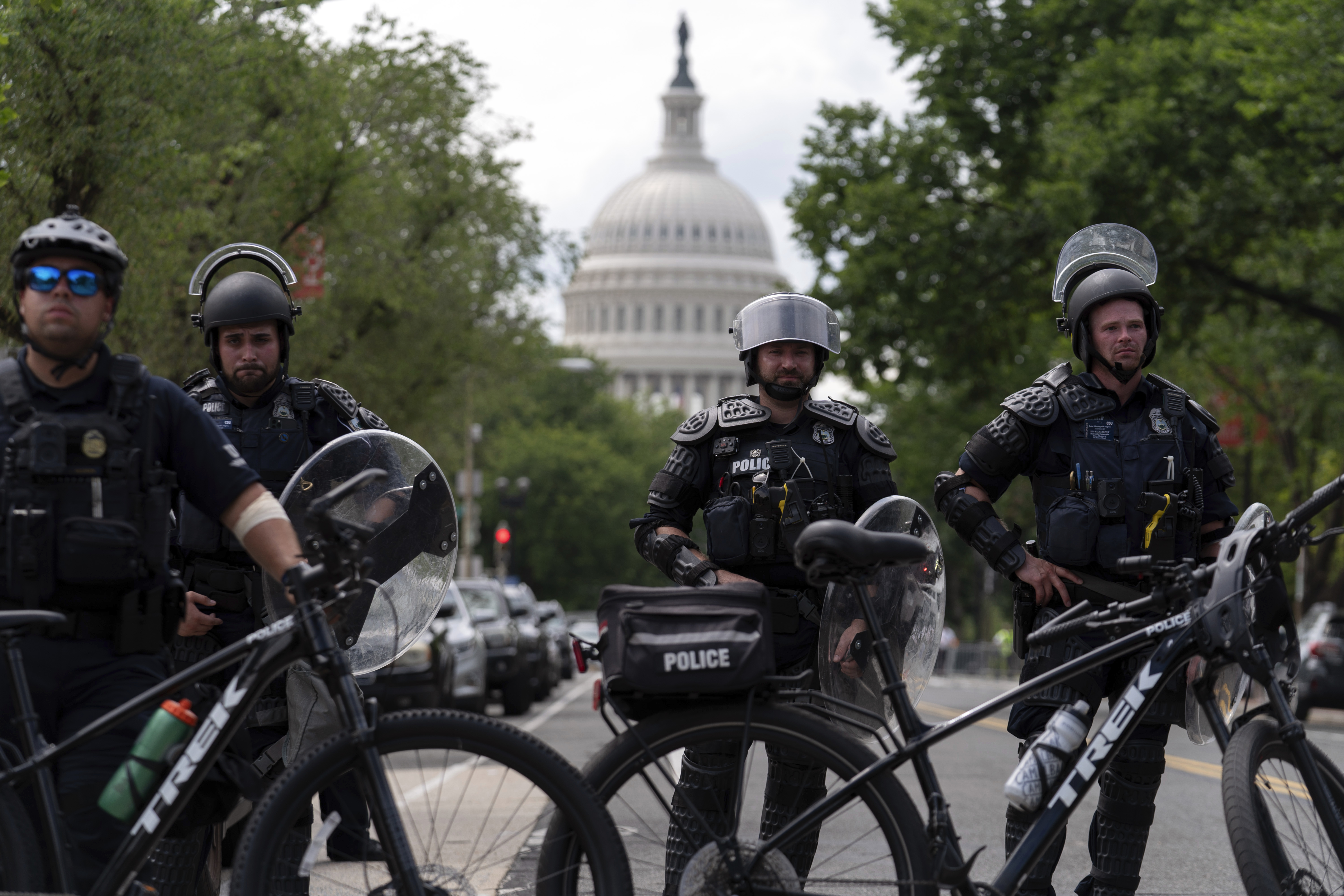 U.S. Capitol police watch demonstrators marching outside of the U.S. Capitol as they protest the visit of Israeli Prime Minister Benjamin Netanyahu on Capitol Hill, Wednesday, July 24, 2024, in Washington. (AP Photo/Jose Luis Magana)