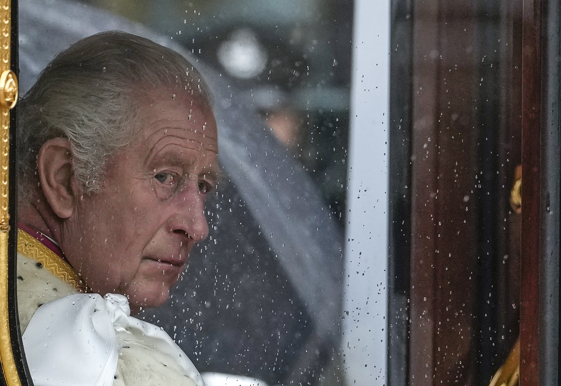 FILE - Britain's King Charles III makes his way to Westminster Abbey prior to his coronation ceremony in London Saturday, May 6, 2023. King Charles III has been diagnosed with a form of cancer and has begun treatment, Buckingham Palace says on Monday, Feb. 5, 2024. (AP Photo/Alessandra Tarantino, File)