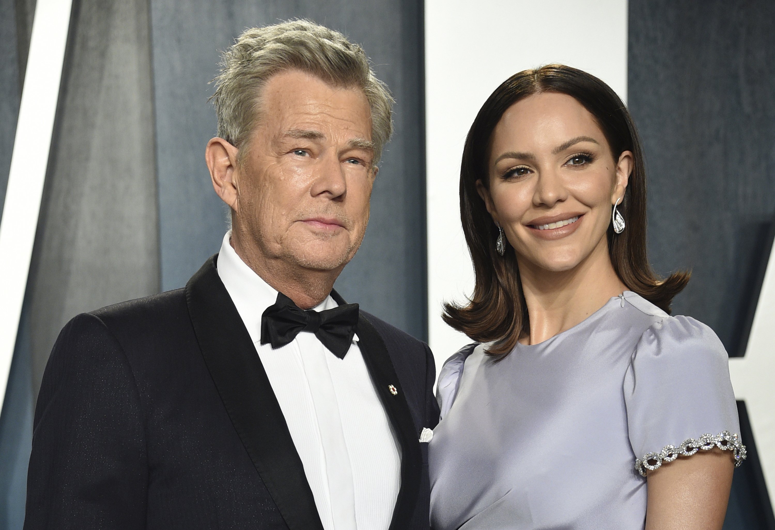 FILE - David Foster, left, and Katharine McPhee arrive at the Vanity Fair Oscar Party on Feb. 9, 2020, in Beverly Hills, Calif. The couple, who wed in 2019, have welcomed a baby boy, McPhee's publicist confirmed Wednesday, Feb. 24, 2021. (Photo by Evan Agostini/Invision/AP, File)