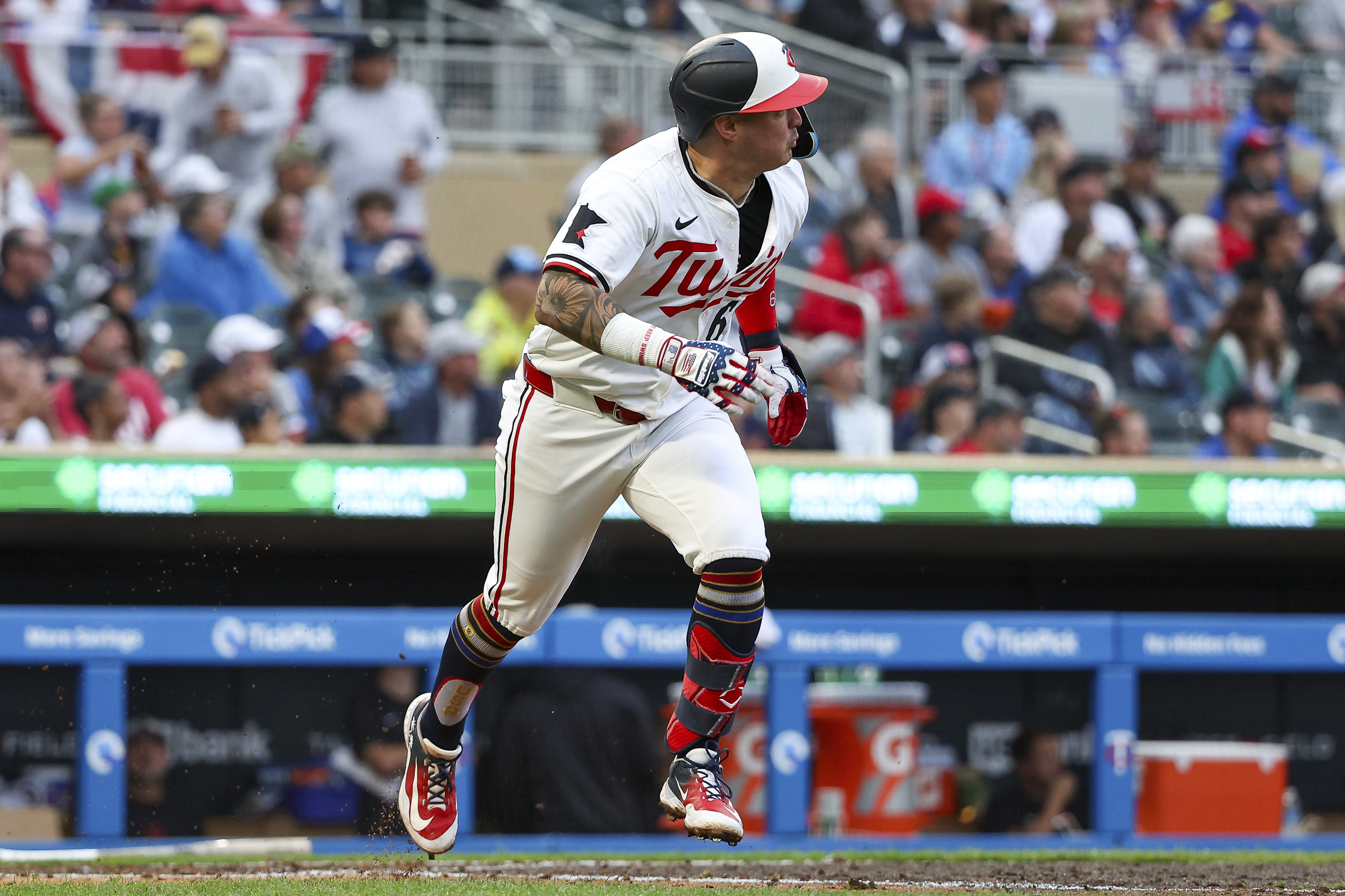 Minnesota Twins' Jose Miranda hits a two RBI double against the Detroit Tigers during the fourth inning of a baseball game, Thursday, July 4, 2024, in Minneapolis. (AP Photo/Matt Krohn)