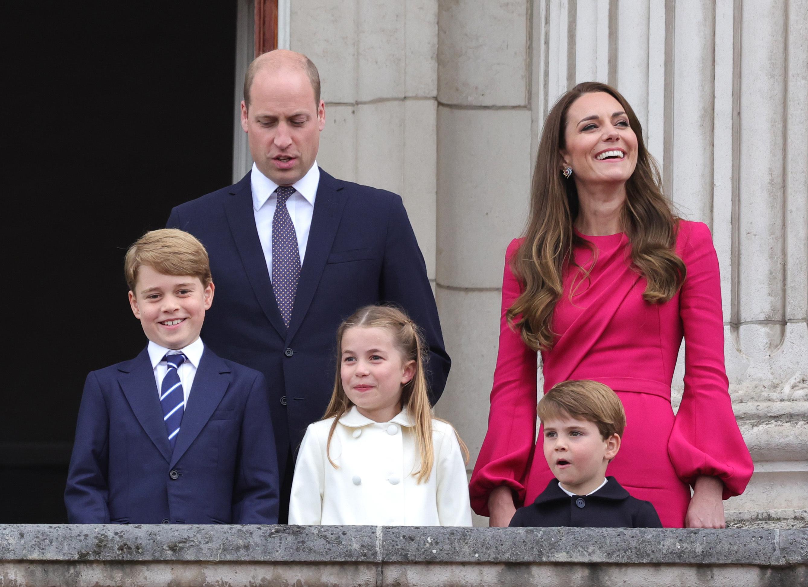 FILE - Britain's Prince William, Kate, Duchess of Cambridge, Prince George, Princess Charlotte and Prince Louis, appear on the balcony of Buckingham Palace, during the Platinum Jubilee Pageant outside Buckingham Palace in London, June 5, 2022. Prince William and his wife, Kate, will relocate their family from central London to more rural dwellings in Windsor, and all three of their children will attend the same private school near their new home, palace officials said Monday Aug. 22, 2022. (Chris Jackson/PA via AP, File)