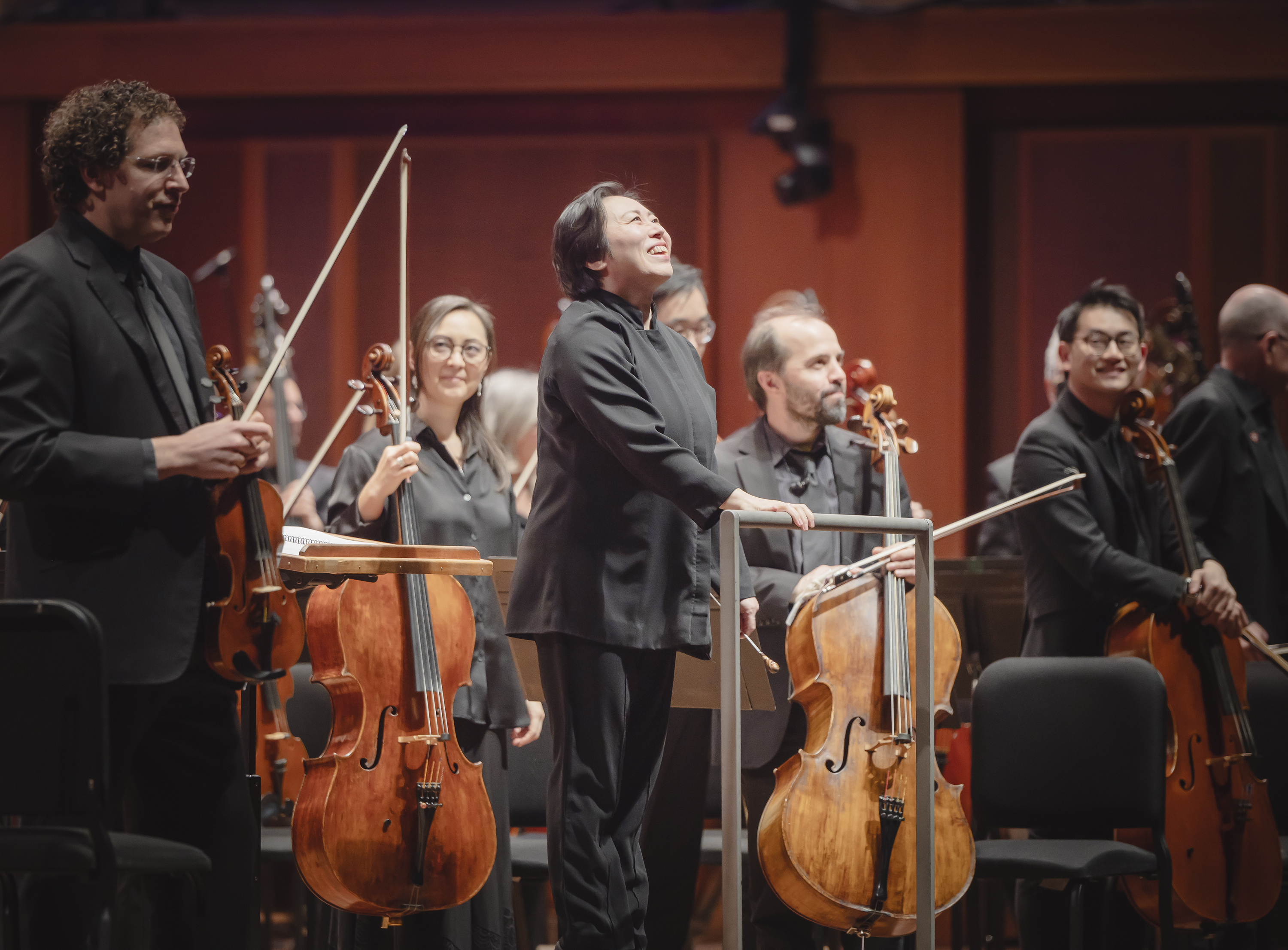 Xian Zhang, center, appears during a pre-concert performance at Benaroya Hall in Seattle on April 4, 2024. (Carlin Ma via AP)