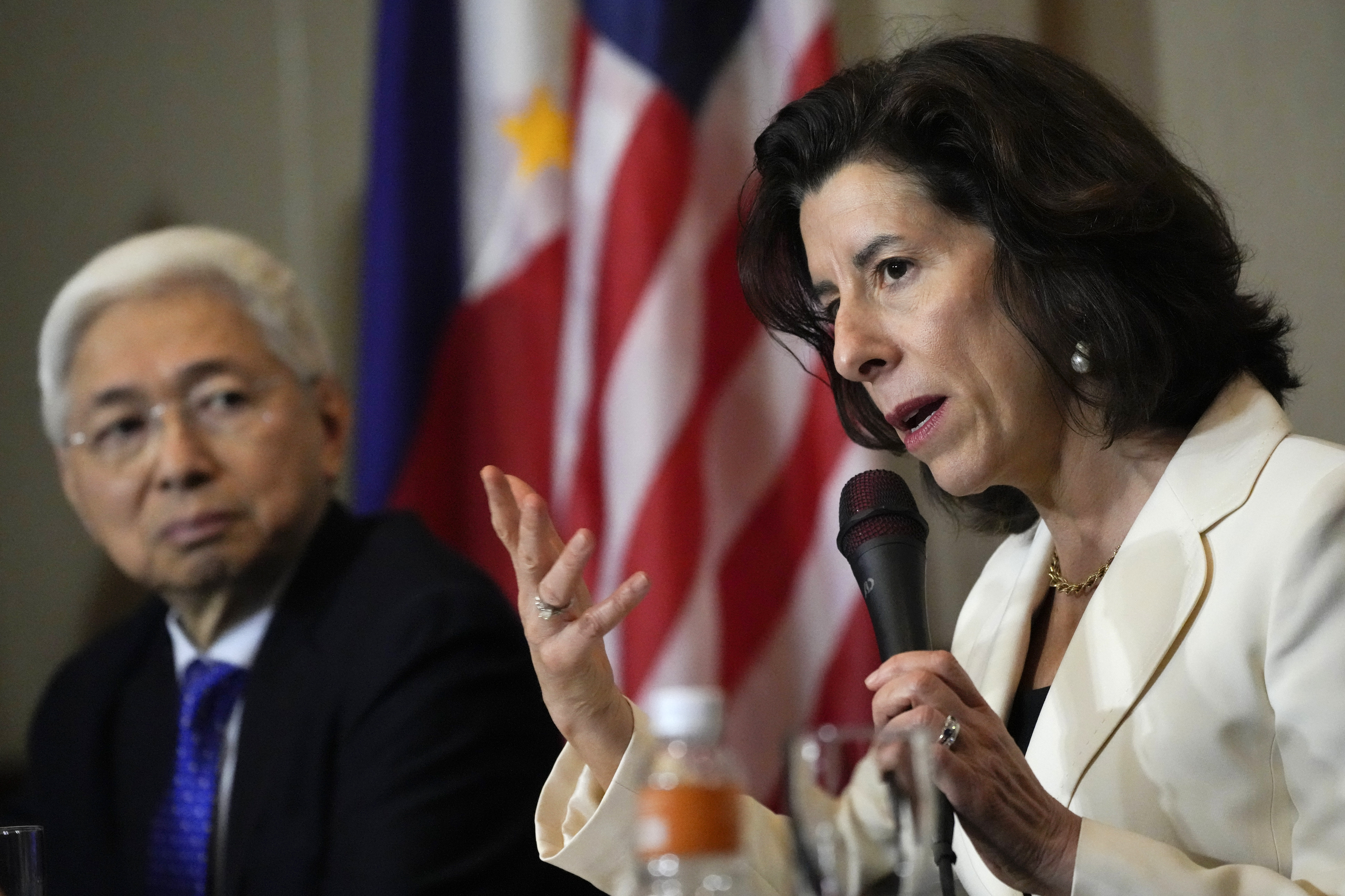 U.S. Commerce Secretary Gina Raimondo, right, talks beside Philippine Trade and Industry Secretary Alfredo Pascual during a press conference at Paranaque city, Philippines on Monday, March 11, 2024. Raimondo led a U.S. Presidential Trade and Investment Mission which aims to boost US contributions to the Philippines and to further strengthen bilateral economic ties. (AP Photo/Aaron Favila)