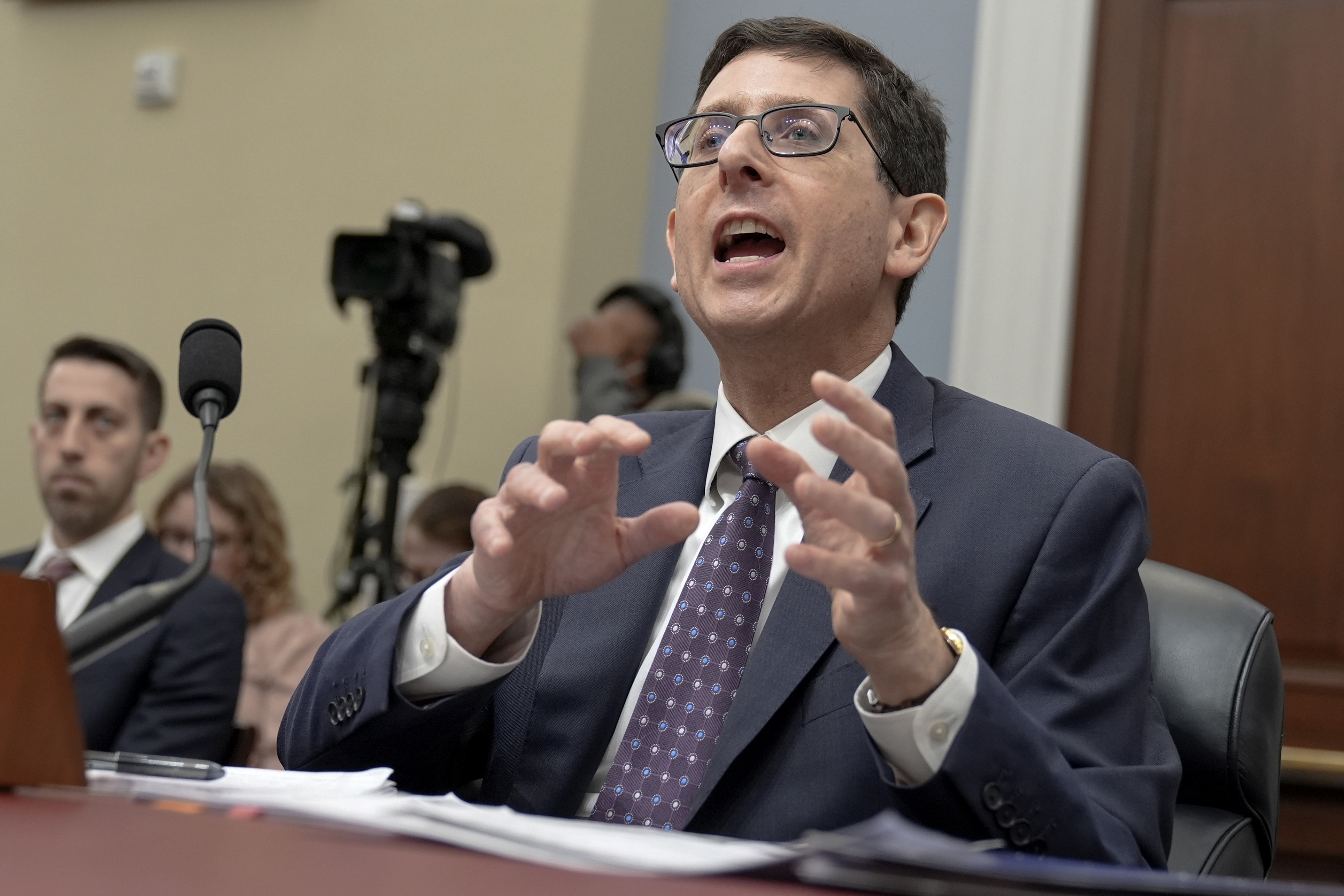 FILE - Phillip Swagel, Director of the Congressional Budget Office, testifies during a House Committee hearing Feb. 14, 2024, on Capitol Hill, in Washington. The CBO said Tuesday, June 18, that it projects a federal budget deficit increase of $400 billion or 27% this year, from its last budget outlook released in February.(AP Photo/Mariam Zuhaib, File)