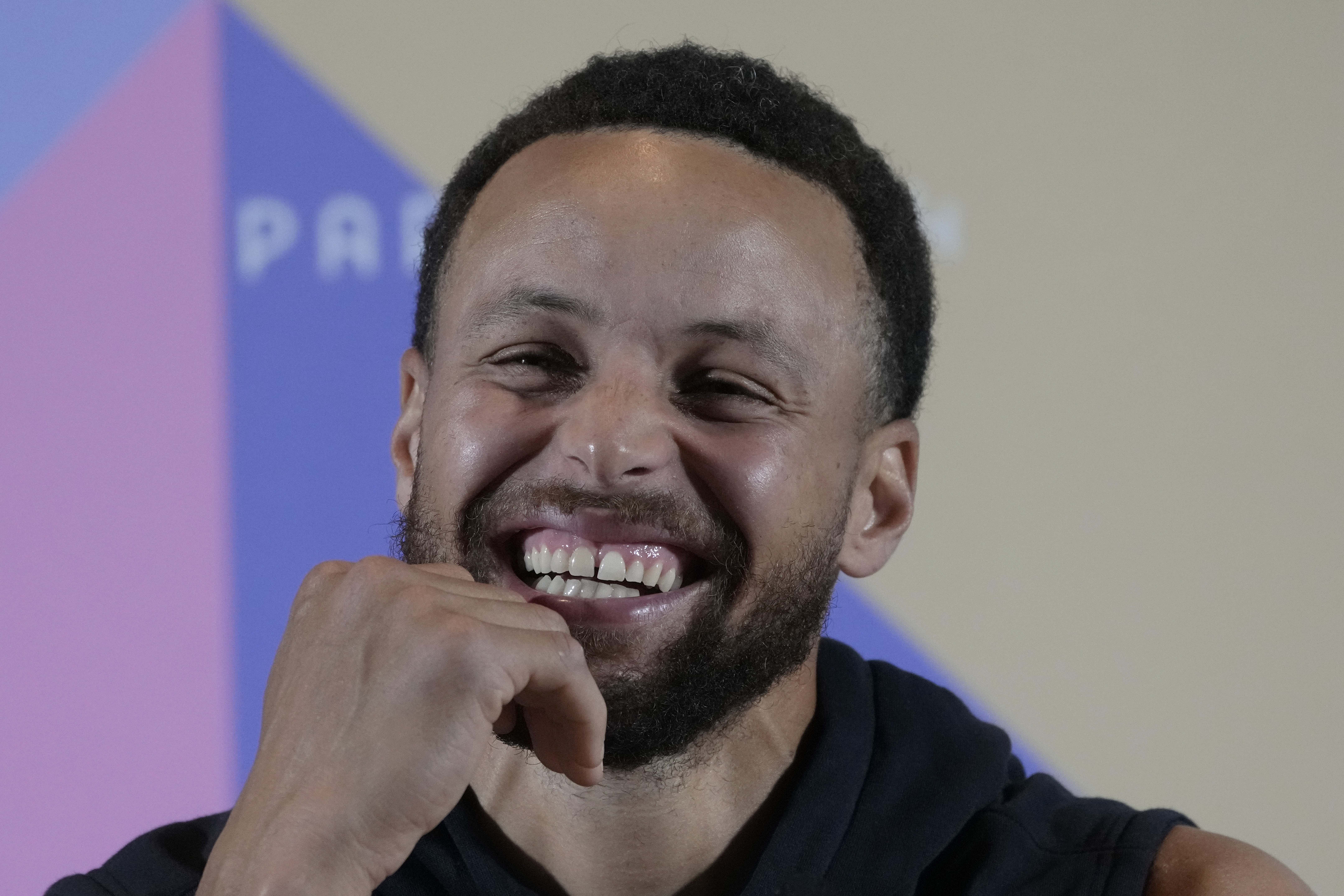 United State's men's team Stephen Curry attends a press conference at the 2024 Summer Olympics, Thursday, July 25, 2024, in Paris, France. (AP Photo/Michel Euler)