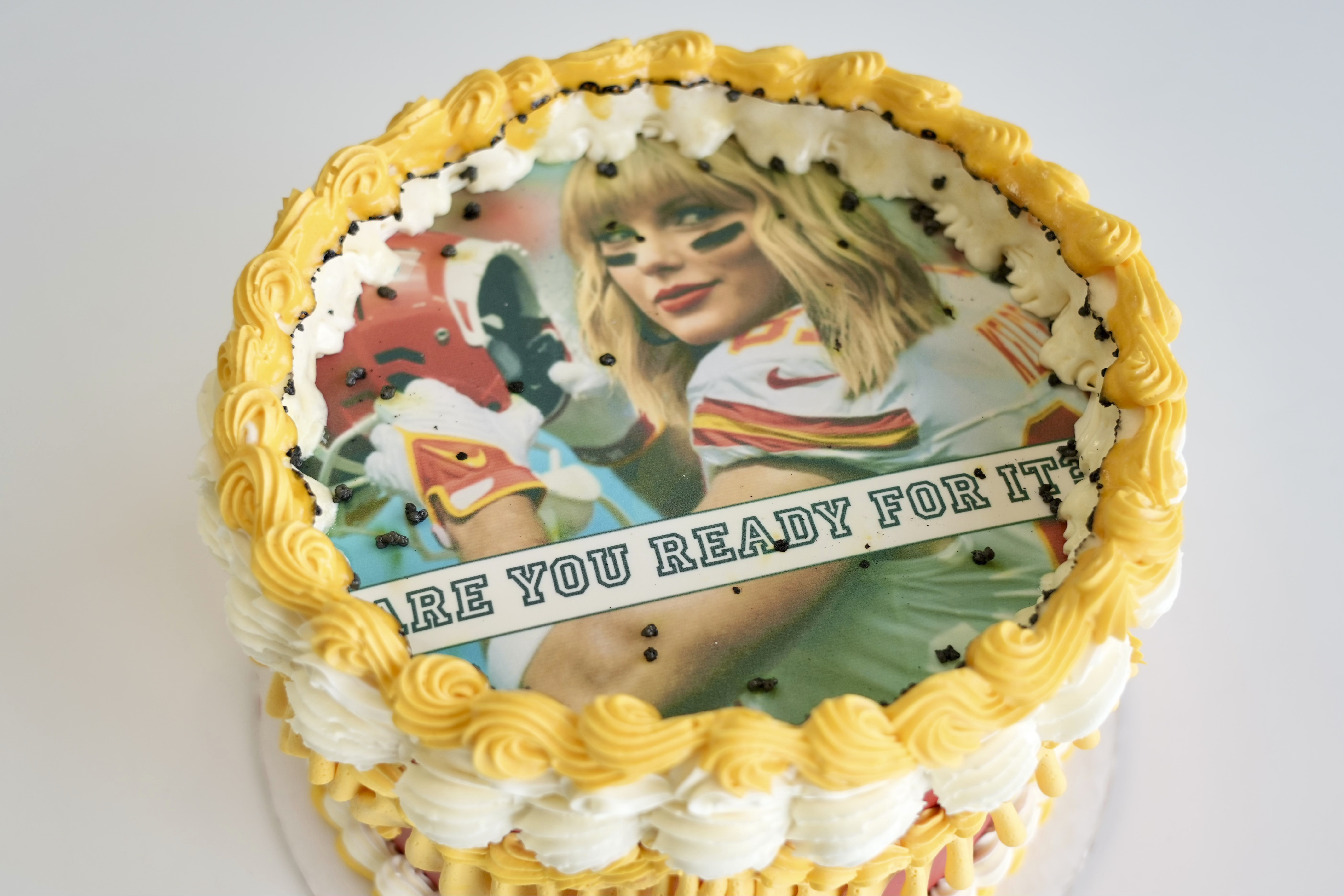 A Taylor Swift-themed "burn away cake" is displayed in Coon Rapids, Minn., Monday, Feb. 5, 2024. Maddie Schmitz, owner of Something Sweet by Maddie Lu, created the Swift/Travis Kelce cakes just in time for NFL football's upcoming Super Bowl. (AP Photo/Mark Vancleave)