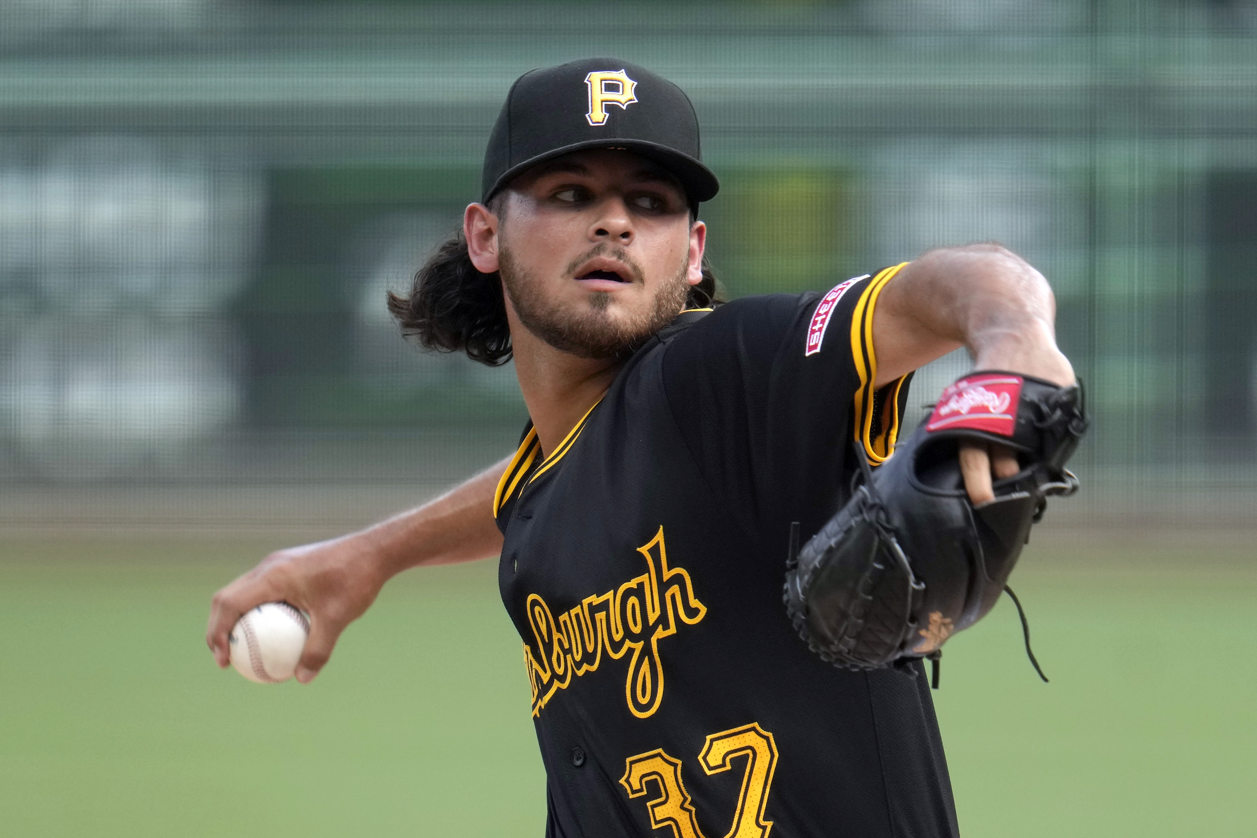 Pittsburgh Pirates starting pitcher Jared Jones delivers during the first inning of a baseball game against the St. Louis Cardinals in Pittsburgh, Wednesday, July 3, 2024. (AP Photo/Gene J. Puskar)