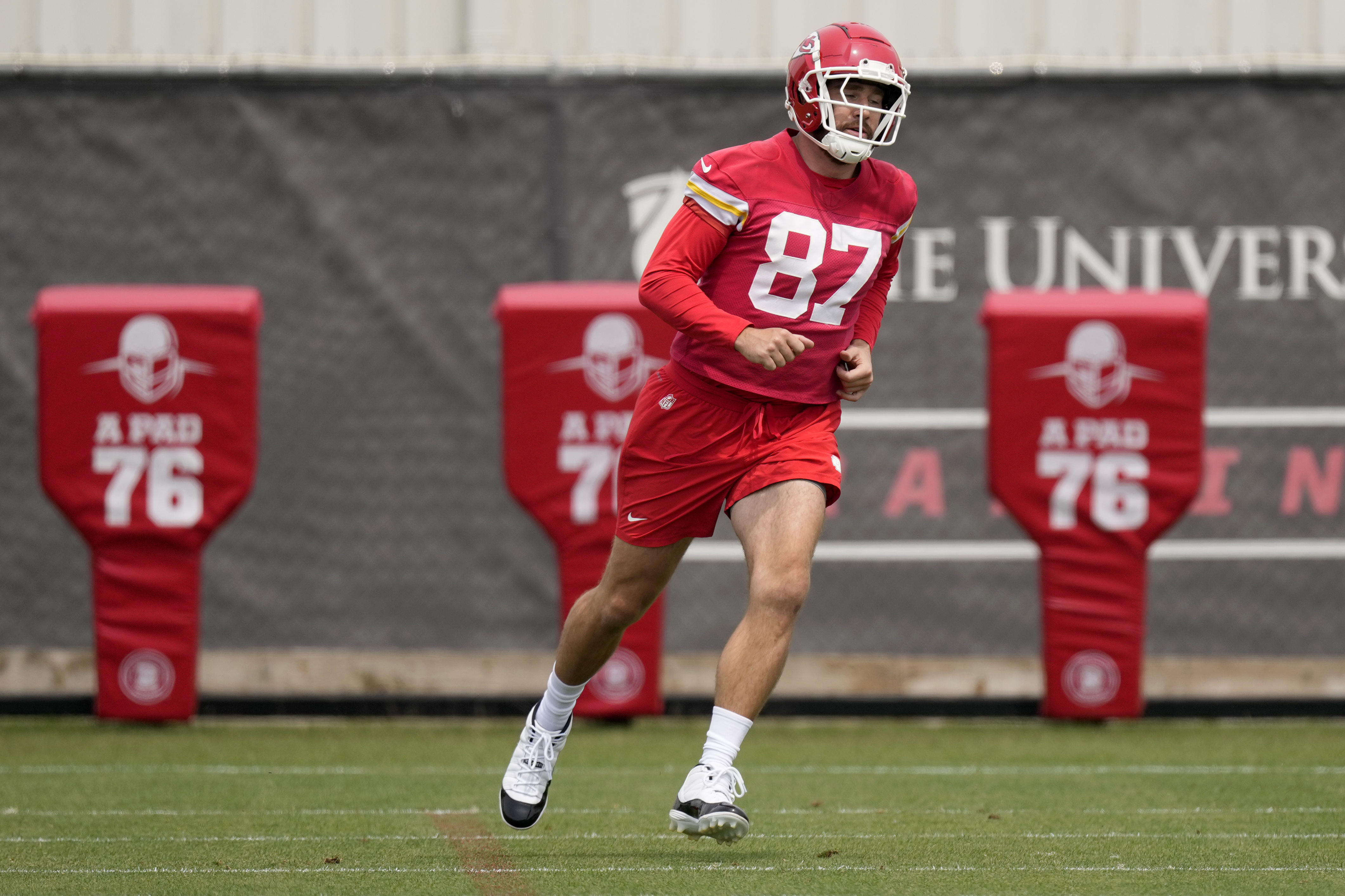 Kansas City Chiefs tight end Travis Kelce runs during the NFL football team's organized team activities Thursday, May 30, 2024, in Kansas City, Mo. (AP Photo/Charlie Riedel)