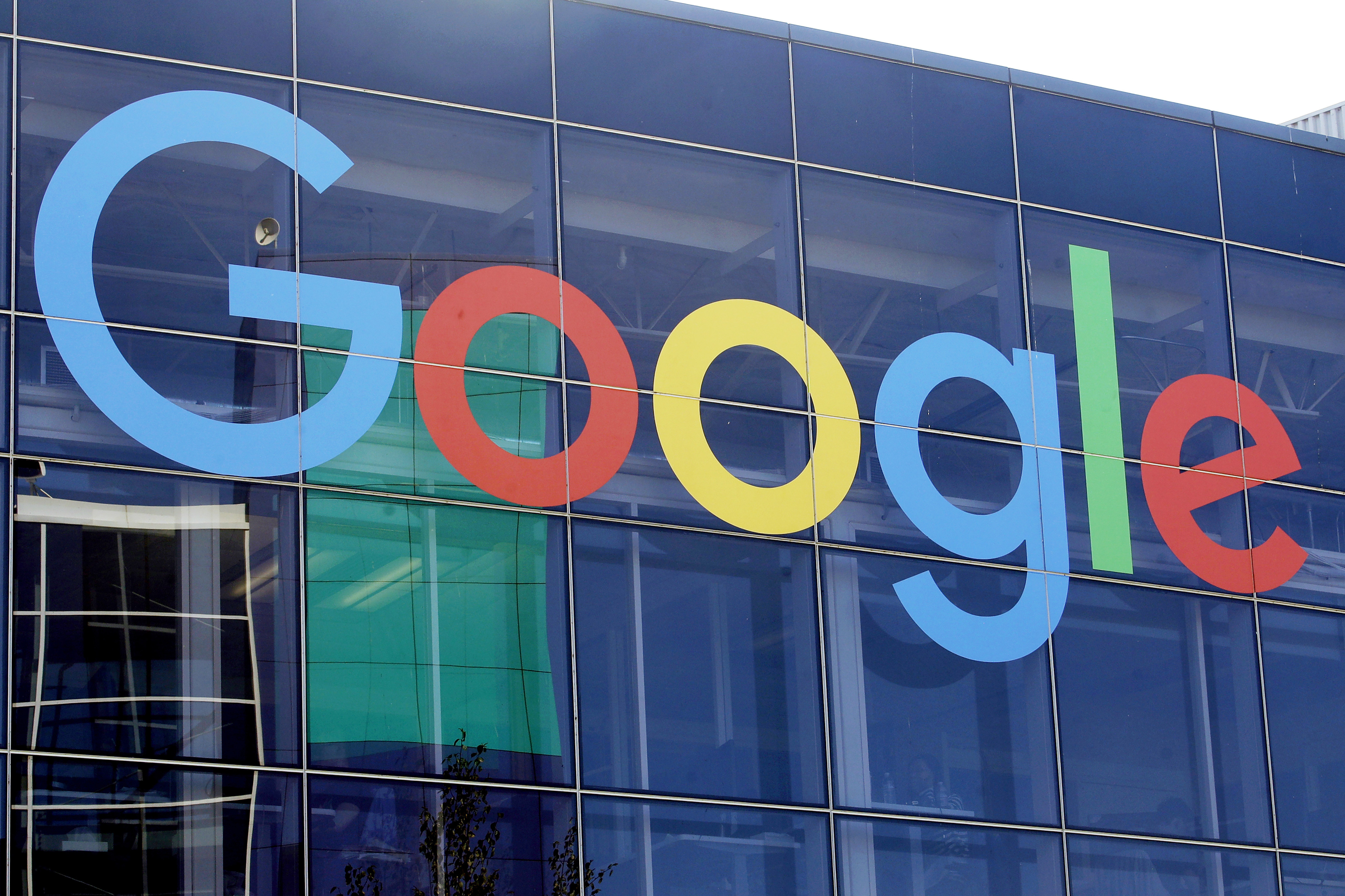 FILE - A sign is displayed on a Google building at their campus in Mountain View, Calif., on Sept. 24, 2019. Google fell far short of its ambitious goals to address climate change by cleaning up its operations, according to the company’s annual Environmental Report released on Tuesday, July 2, 2024. (AP Photo/Jeff Chiu, File)