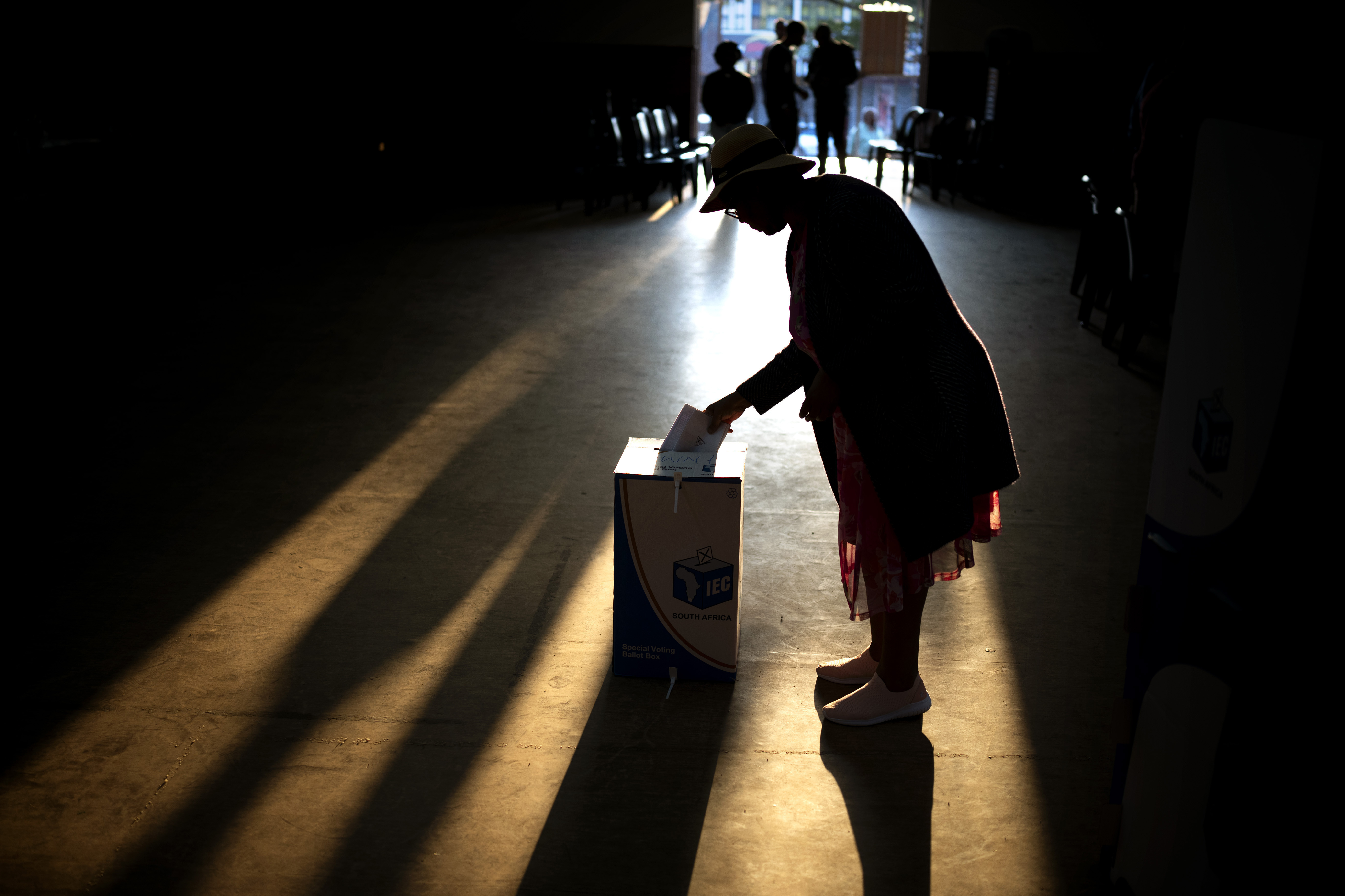 FILE - A woman casts her ballot at a polling station, during general elections in Eshowe, South Africa, on May 29, 2024. (AP Photo/Emilio Morenatti, File)