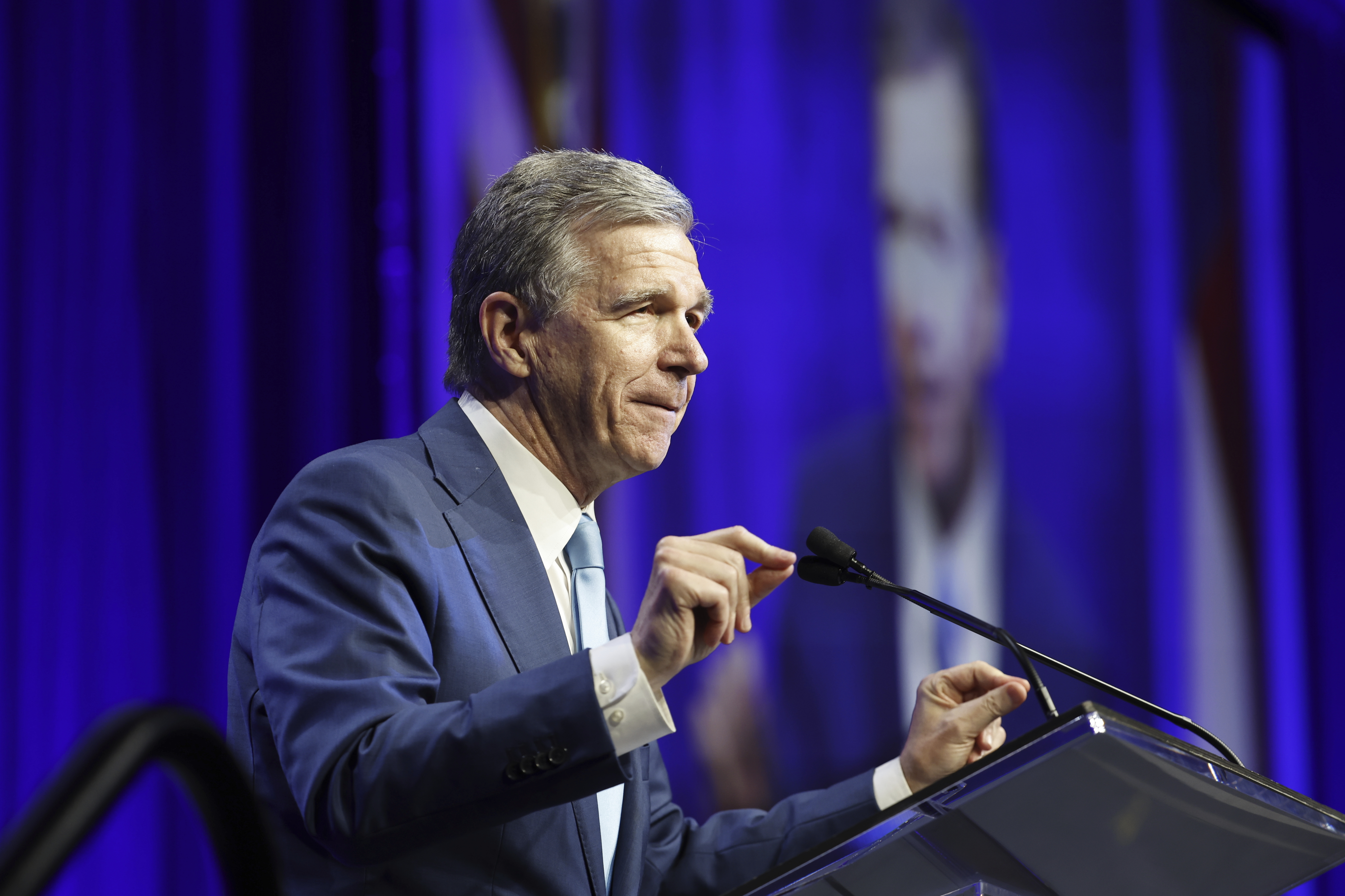 N.C. Gov. Roy Cooper speaks at the North Carolina Democratic Unity Dinner fundraiser in Raleigh, N.C., Saturday, July 20, 2024. (AP Photo/Karl B DeBlaker)