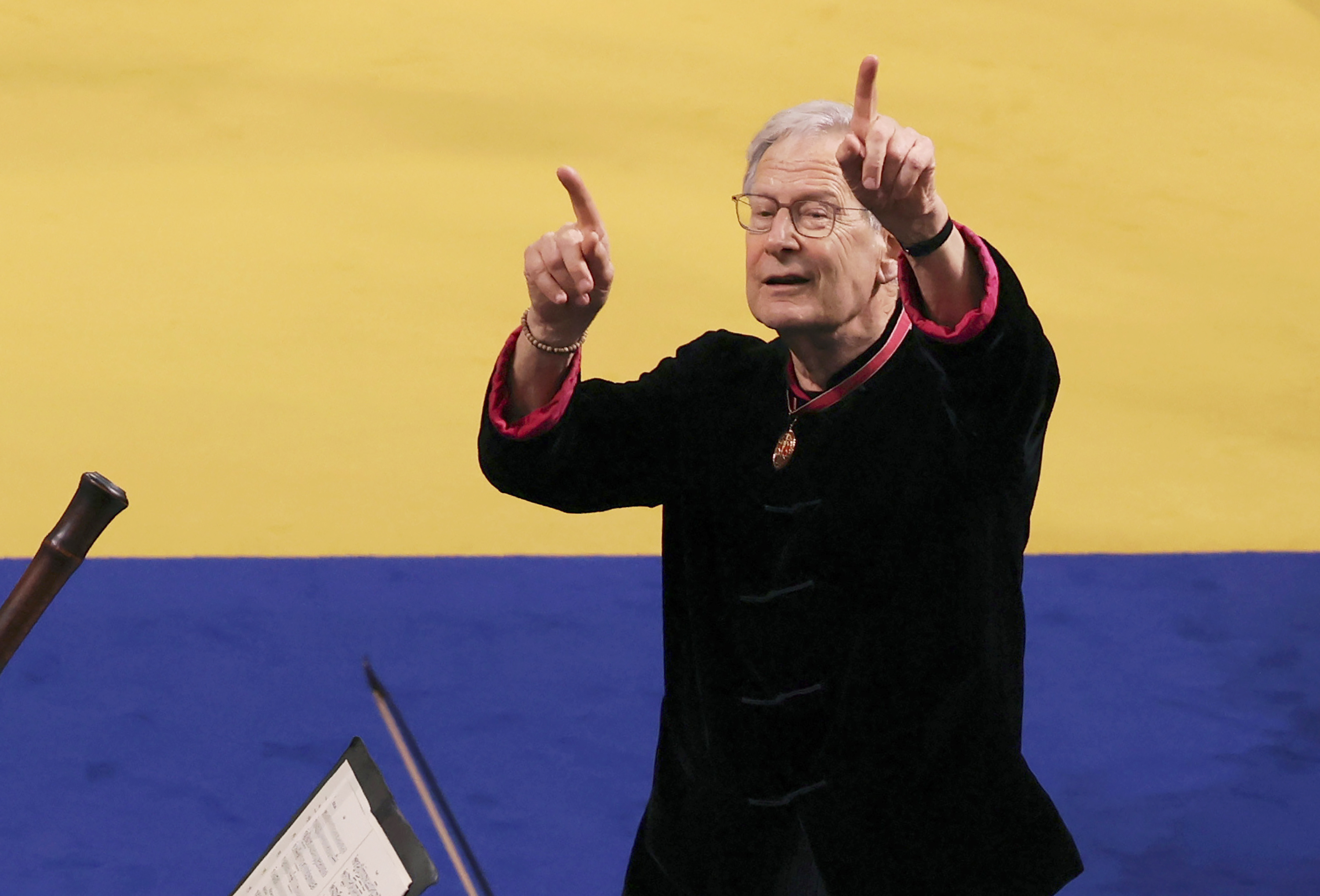 FILE - Conductor John Eliot Gardiner leads musicians as they perform in Westminster Abbey, ahead of the coronation of King Charles III and Camilla, the Queen Consort, in London, on May 6, 2023. Renowned British conductor John Eliot Gardiner has announced he is quitting the orchestra he has led for six decades. (Richard Pohle /Pool via AP, File)