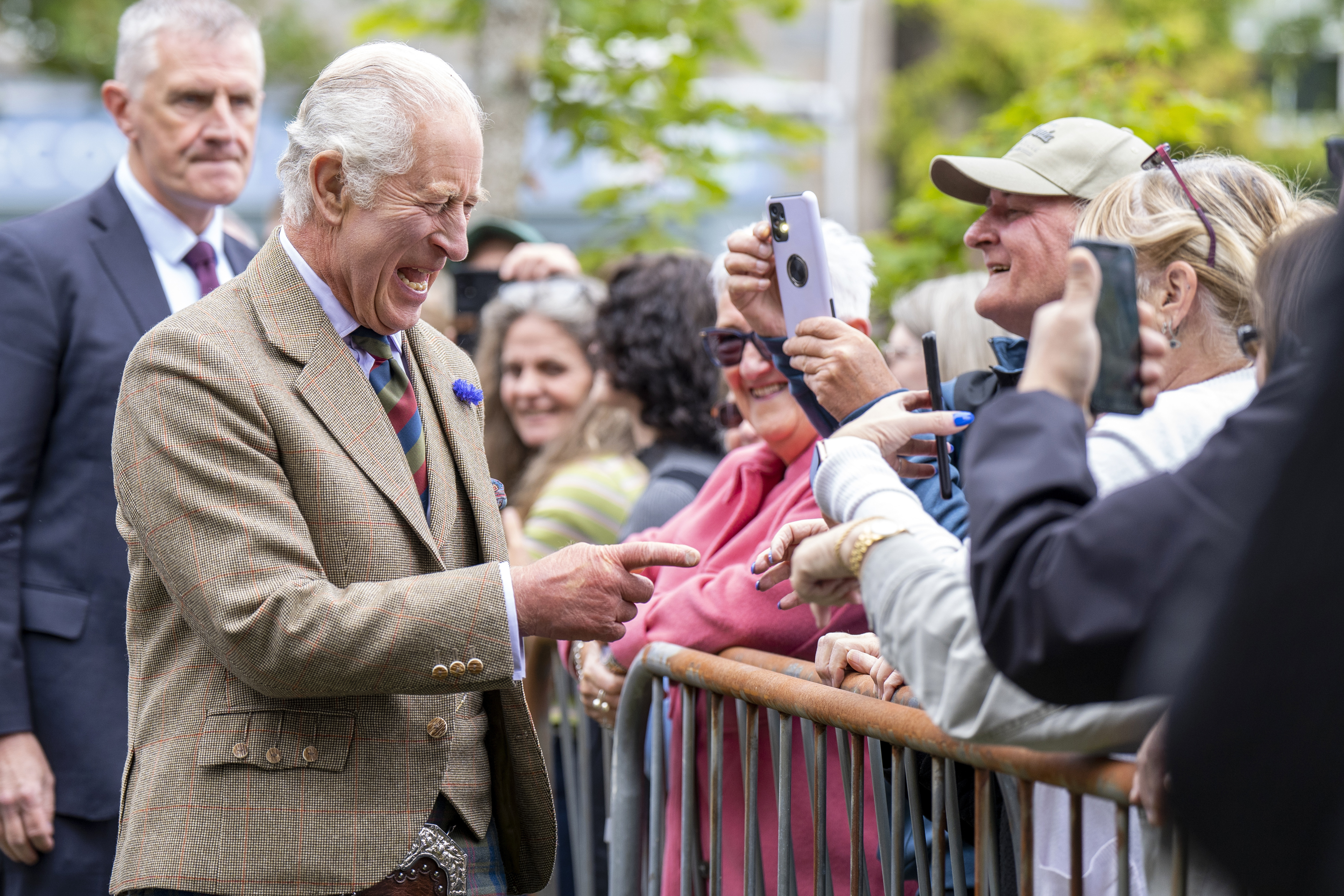 FILE - Britain's King Charles III meets members of the public during his visit the Discovery Centre and Auld School Close to hear more about the 3.3million pound (4.1 million US dollars) energy efficient housing project in the area, in Tomintoul, Scotland, on Sept. 13, 2023. King Charles III won’t be out and about much over the next six weeks _ and it’s not because of his ongoing cancer treatments. Shortly after U.K. Prime Minister Rishi Sunak called early parliamentary elections for July 4, Buckingham Palace said that all members of the royal family were cancelling most public engagements until after the vote to avoid doing anything that might divert attention from the campaign. (Jane Barlow/Pool Photo via AP, File)