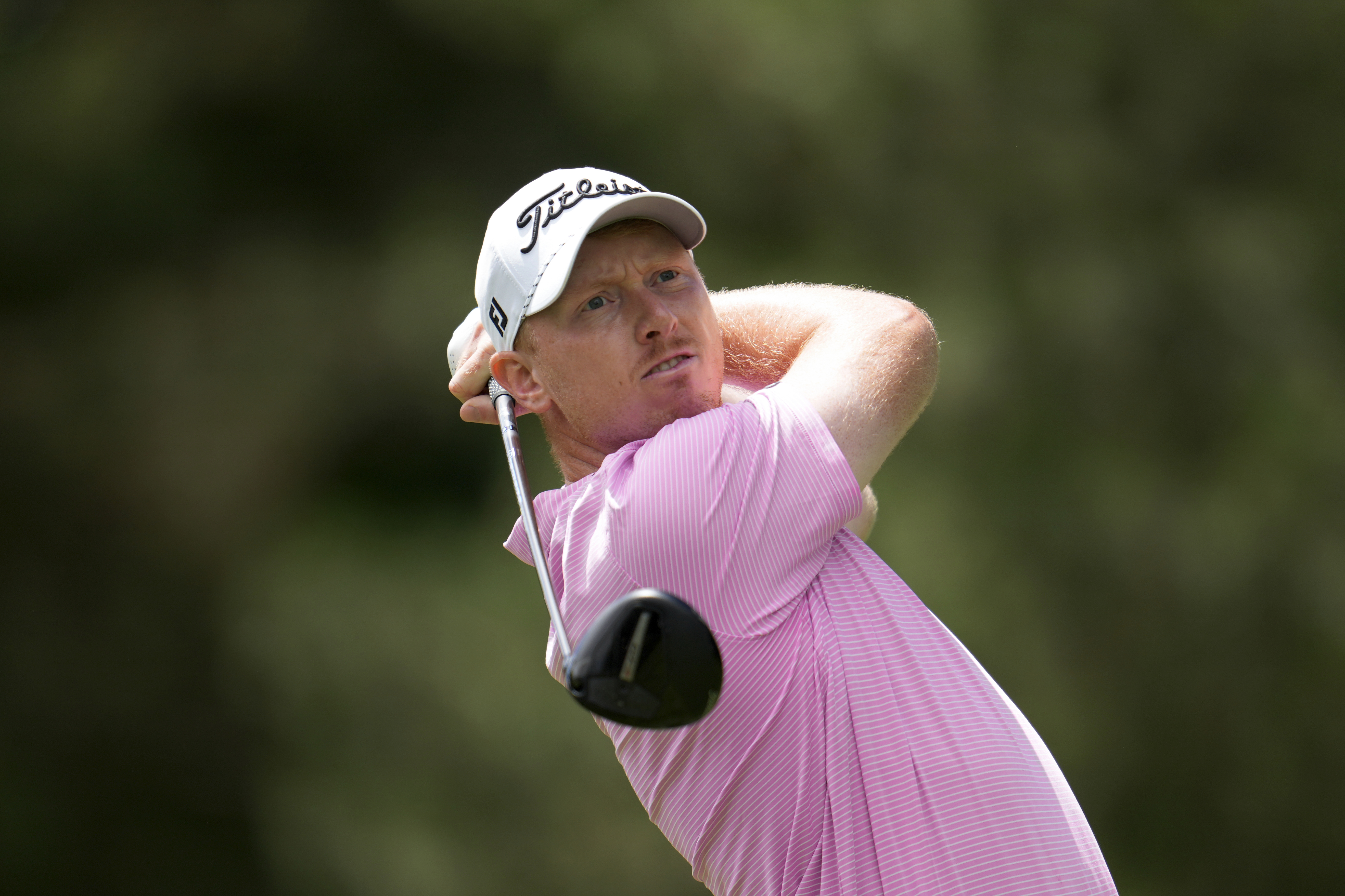 FILE - Hayden Springer hits from the fourth tee during the final round of the Rocket Mortgage Classic golf tournament at Detroit Country Club, Sunday, June 30, 2024, in Detroit. Hayden Springer posted the 14th sub-60 round in PGA Tour history when he finished eagle-birdie in the John Deere Classic on Thursday, July 4, 2024, for a 12-under 59. (AP Photo/Paul Sancya, File)